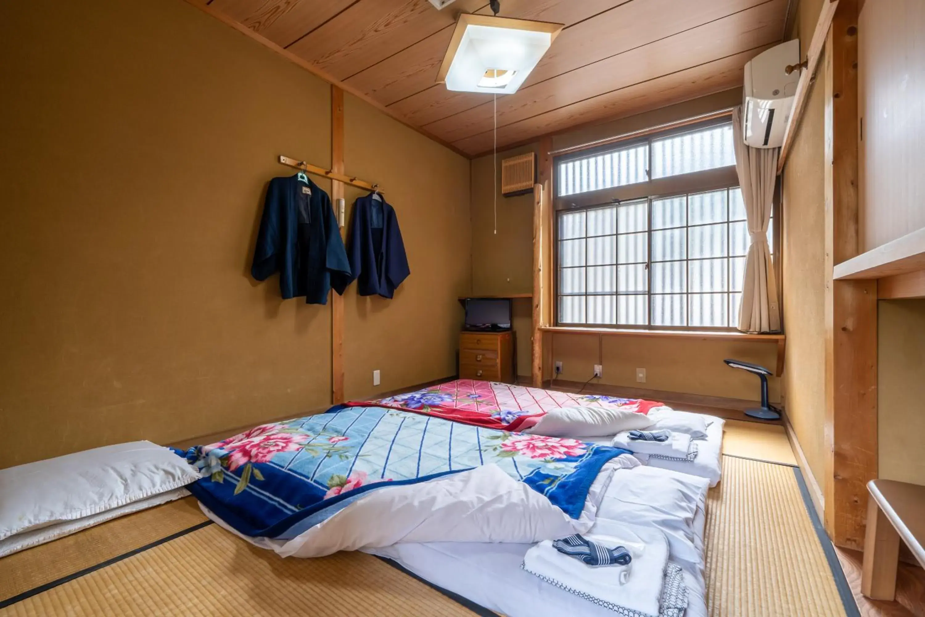 Bed in RYOKAN YAMAZAKI 