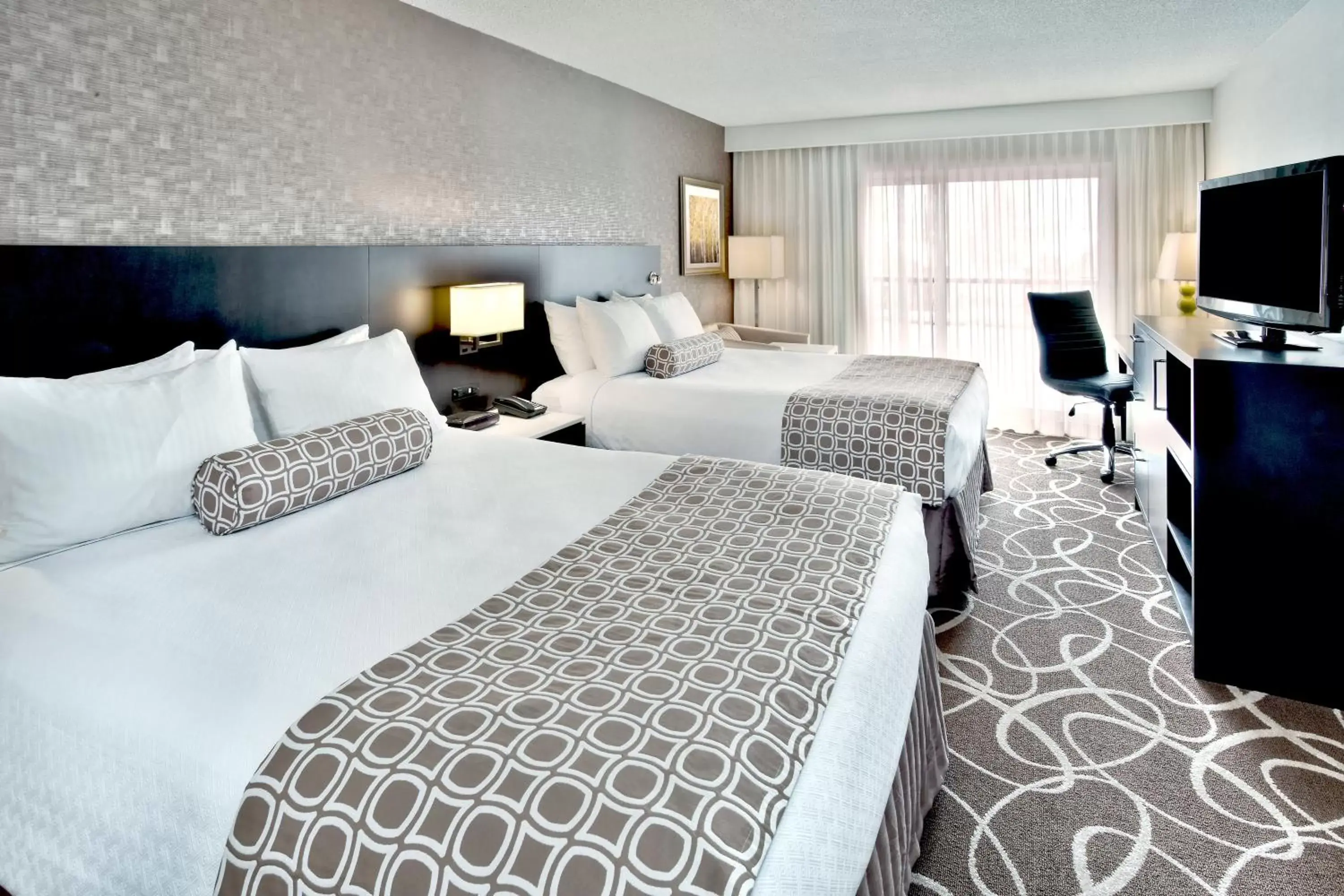 Photo of the whole room, Bed in Crowne Plaza Kitchener-Waterloo, an IHG Hotel