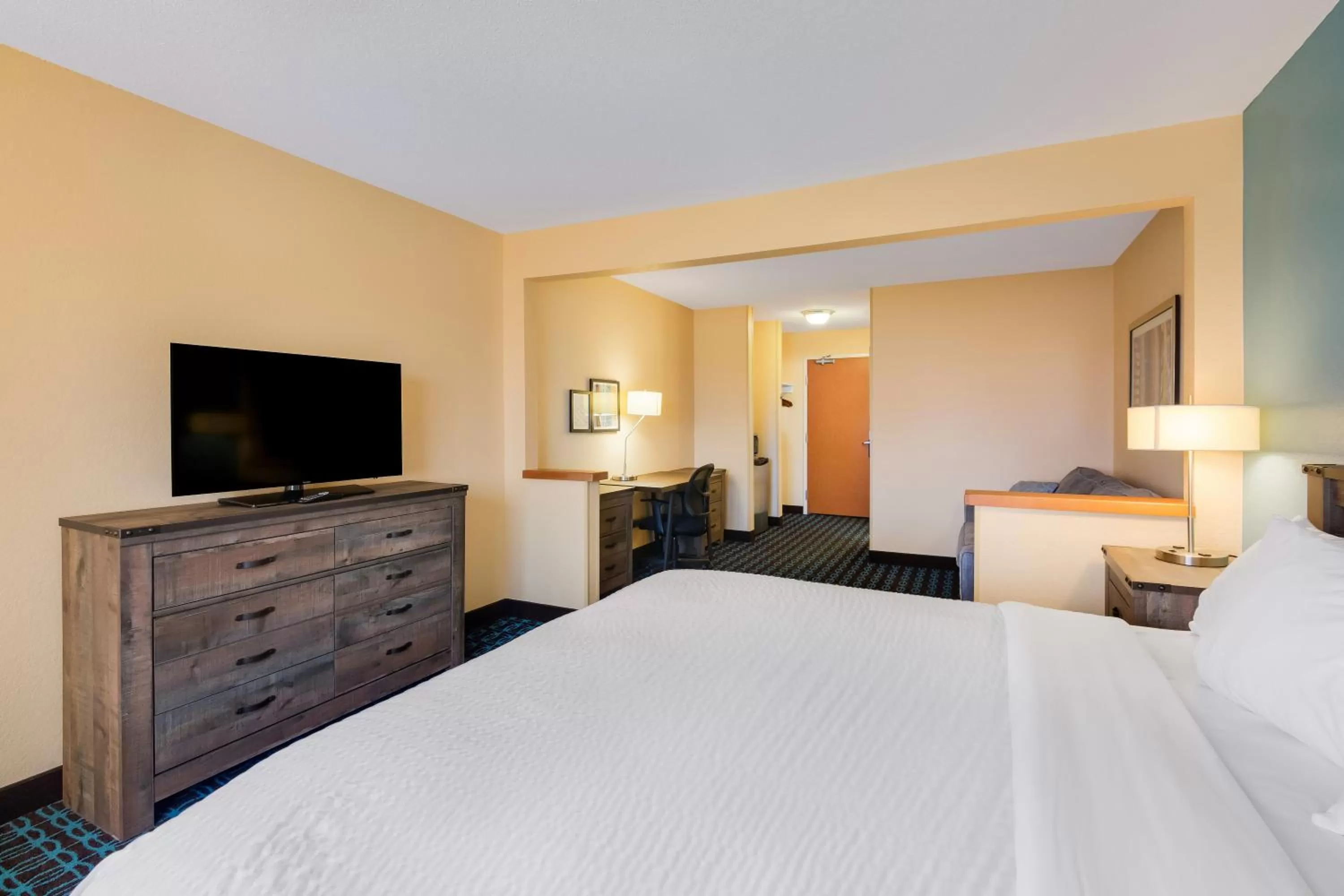 King Suite with Sofa Bed - Non-Smoking in SureStay Plus Hotel by Best Western Minot