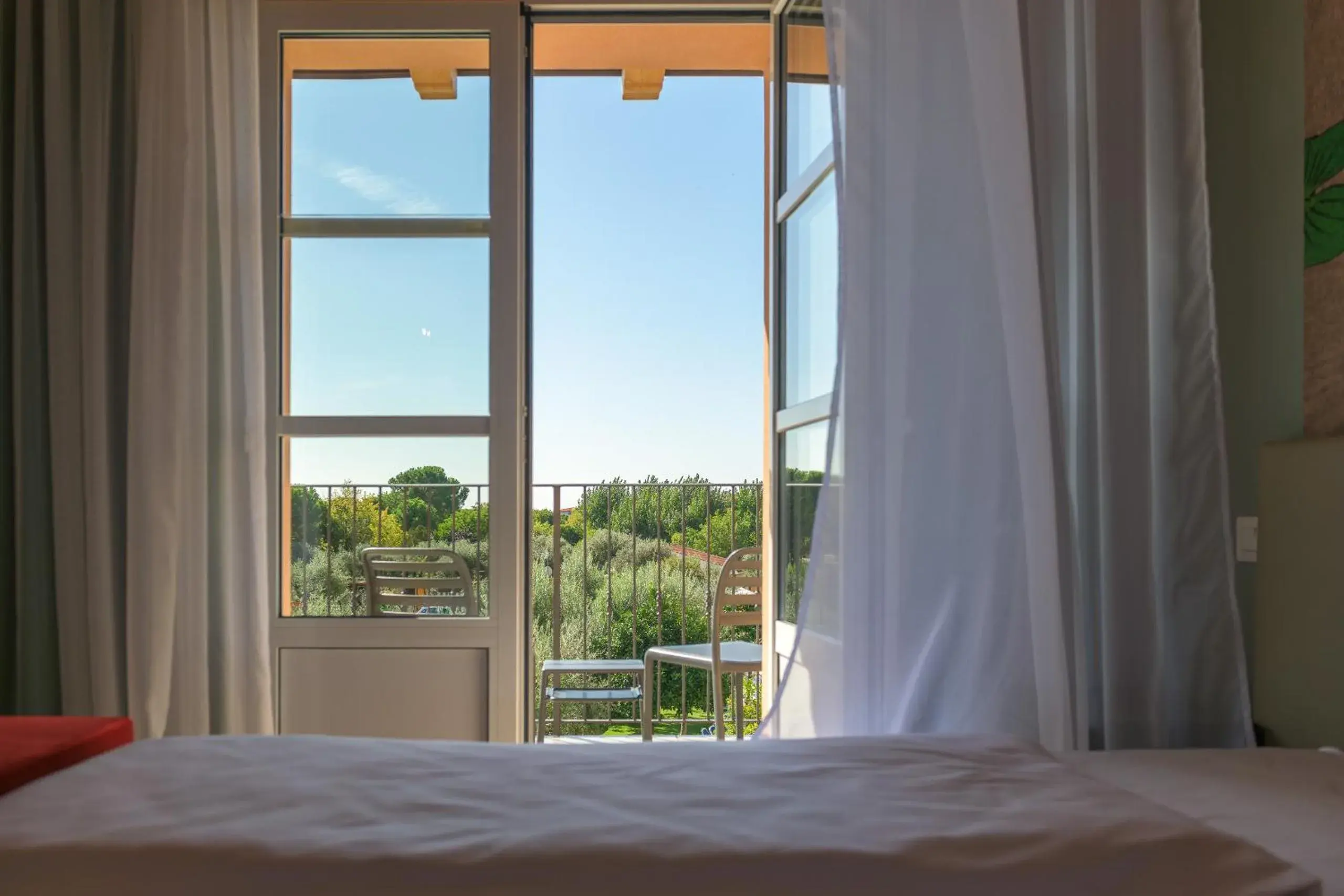 View (from property/room), Bed in Regina del Garda Suite