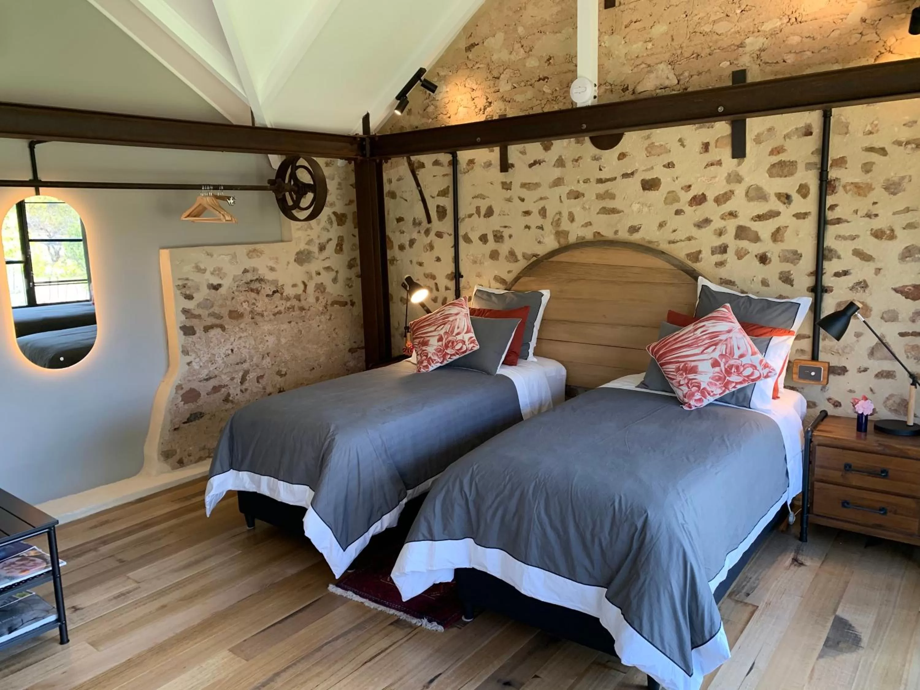 Bed in The Old Chaff Mill Organic Vineyard Retreat