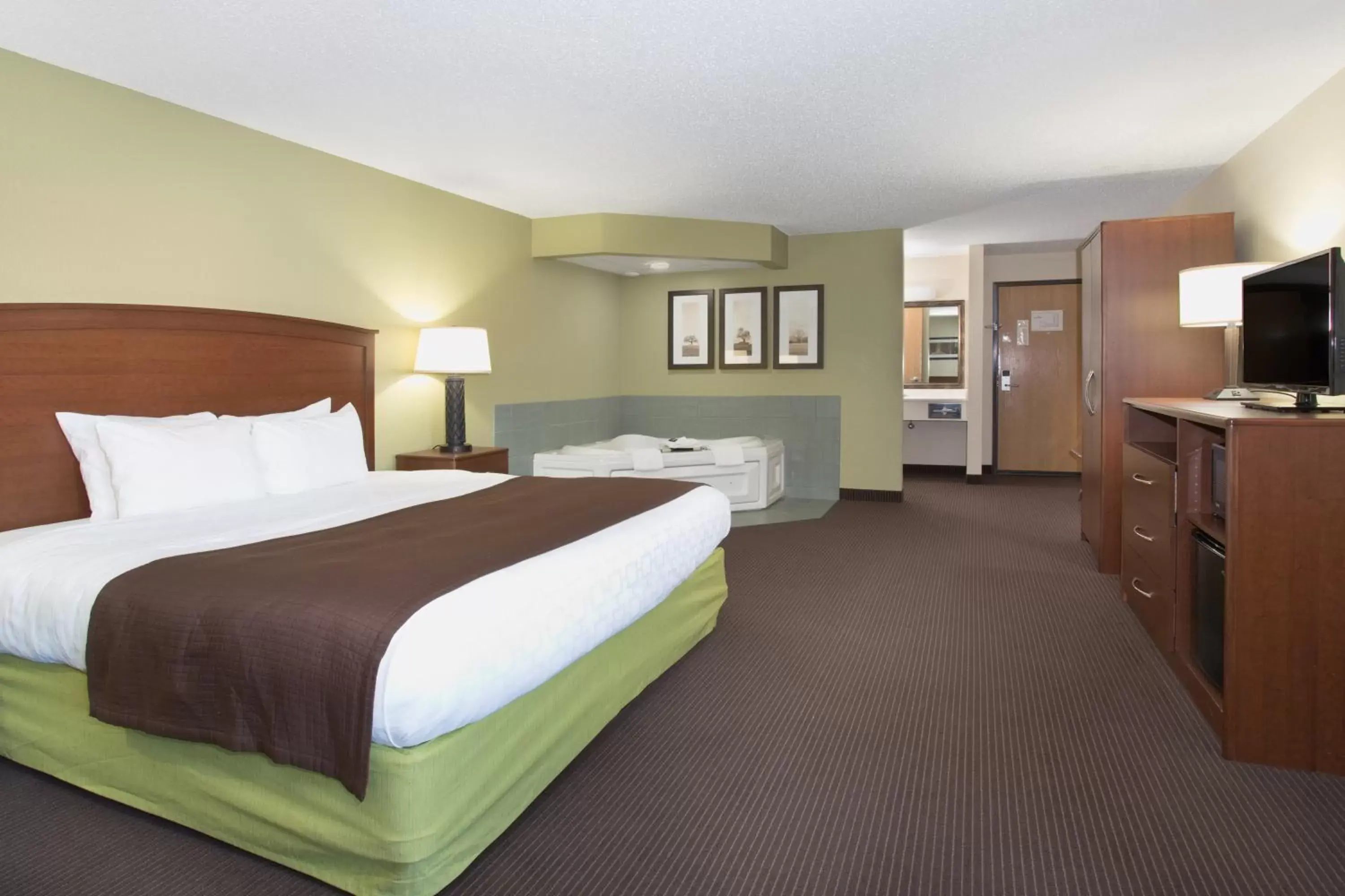 Bedroom in Cobblestone Hotel & Suites - Wisconsin Rapids