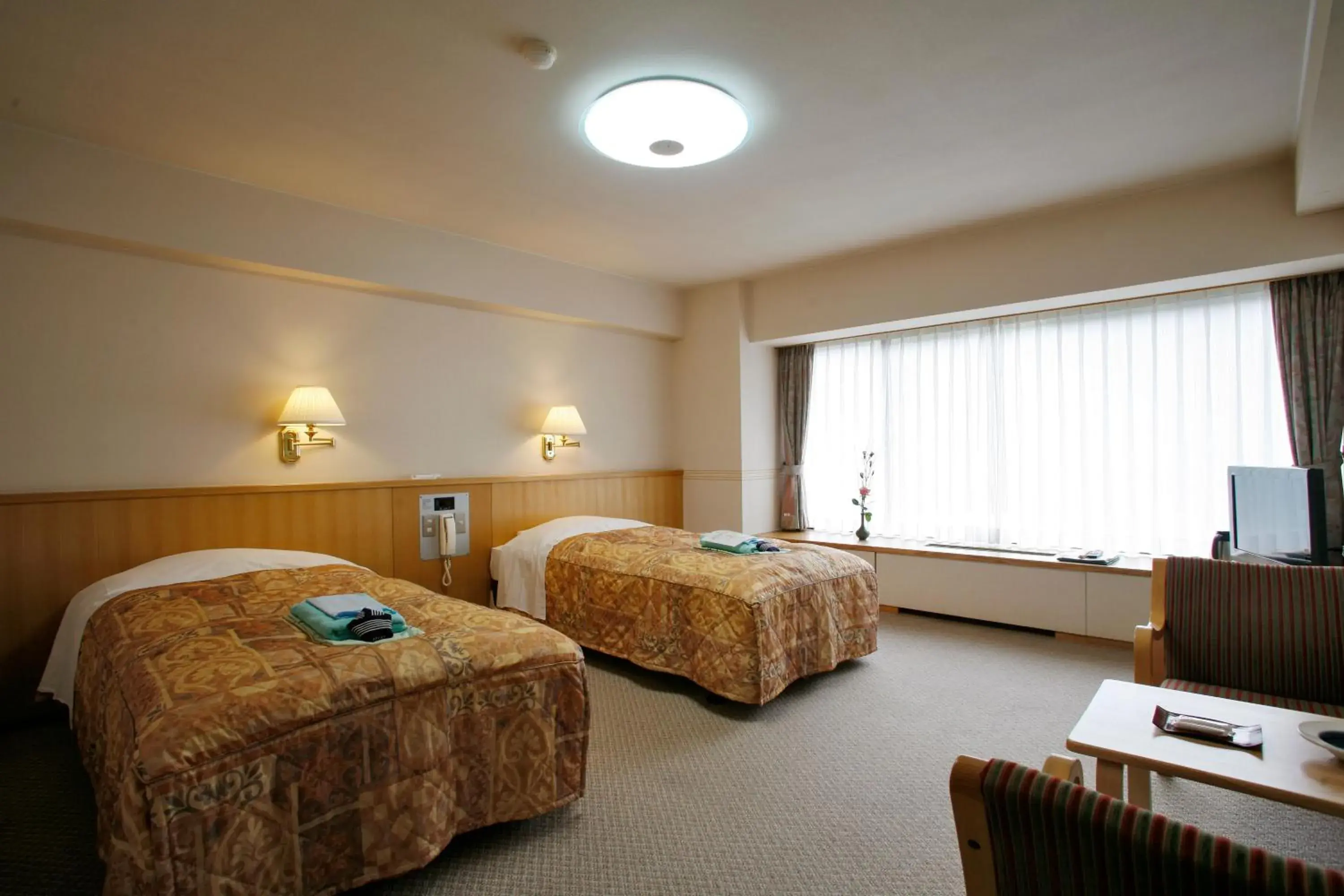 Photo of the whole room, Bed in Sounkyo Kanko Hotel