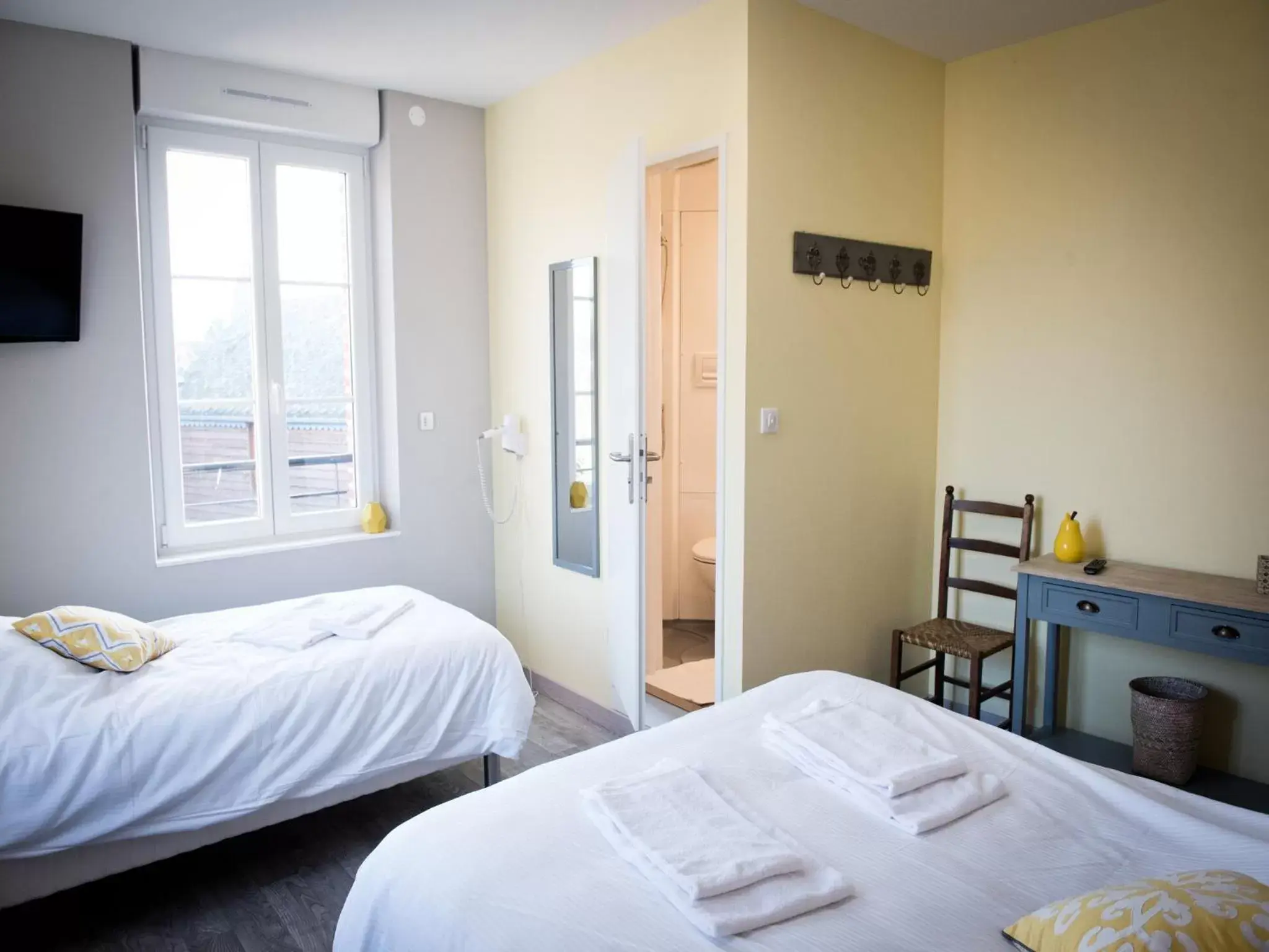 Photo of the whole room, Bed in Logis Hotel Restaurant Le Relais Fleuri Photo of the whole room, Bed in Logis Hotel Restaurant Le Relais Fleuri