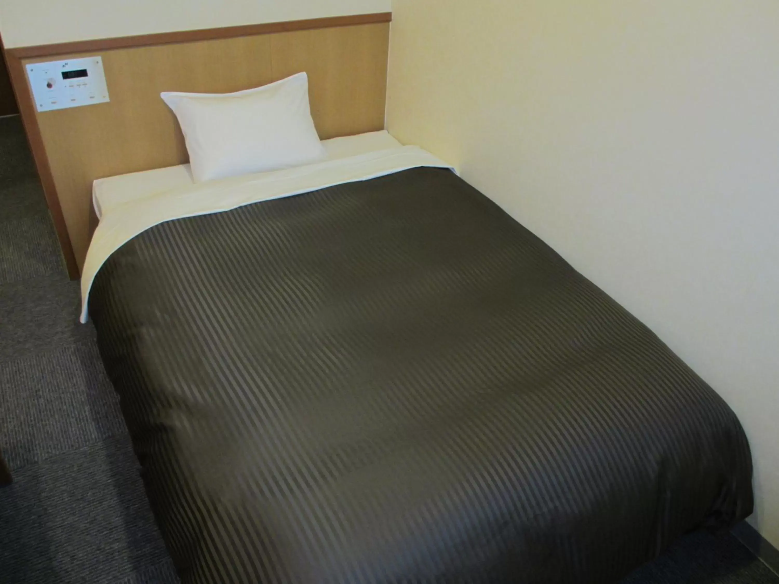 Bed in Hotel Axia Inn Kushiro