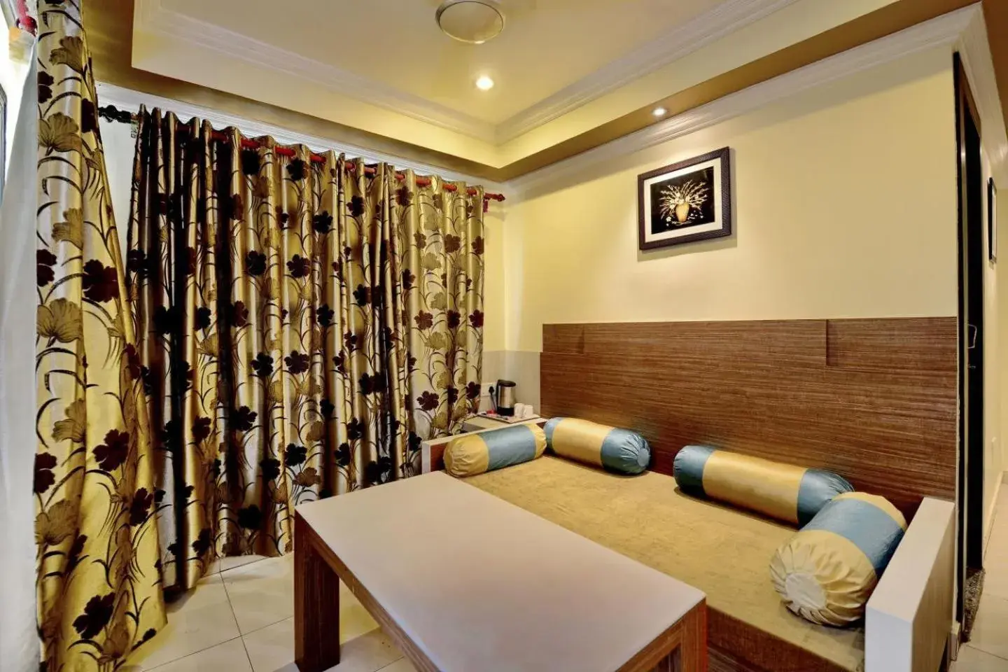 Bedroom, Dining Area in Hotel Pushpak