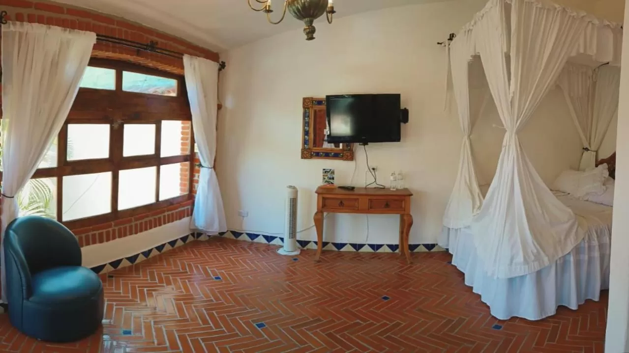 Bed in Posada Los Alcatraces