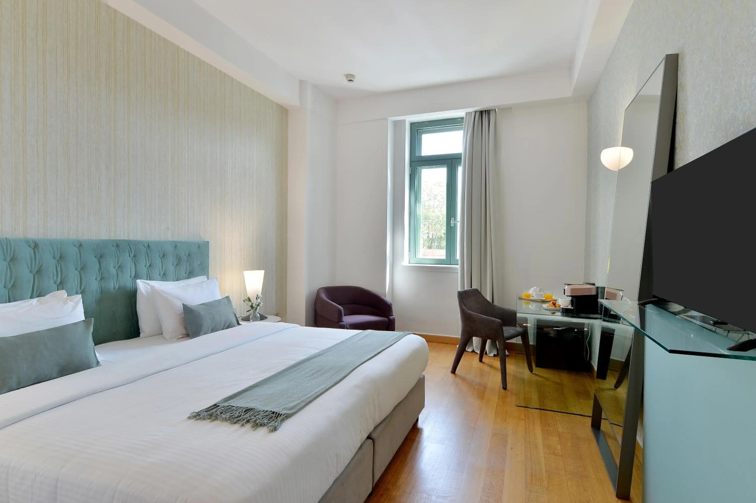 Bed in Athenaeum Eridanus Luxury Hotel
