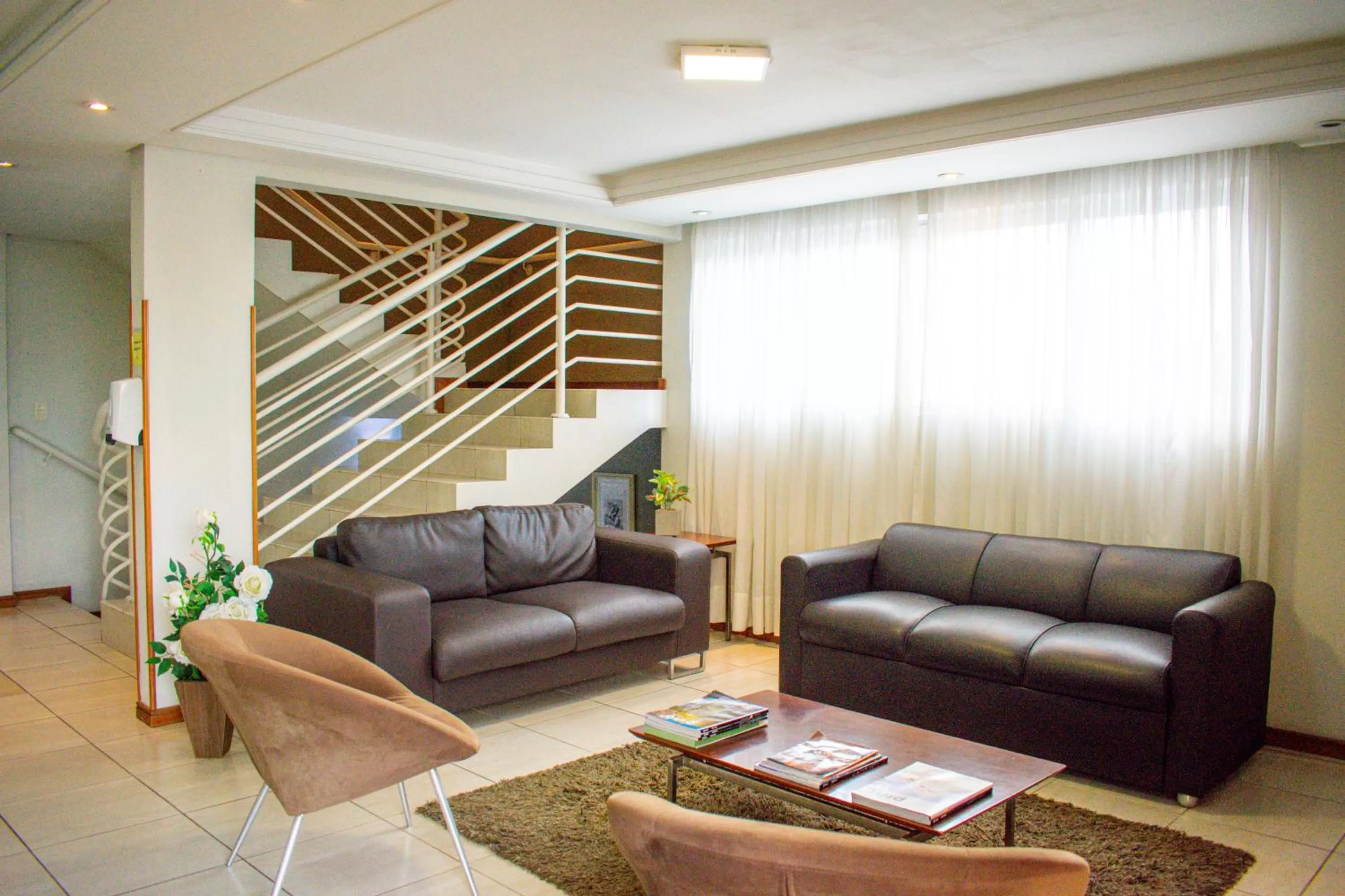 Living room in Barigui Park Hotel