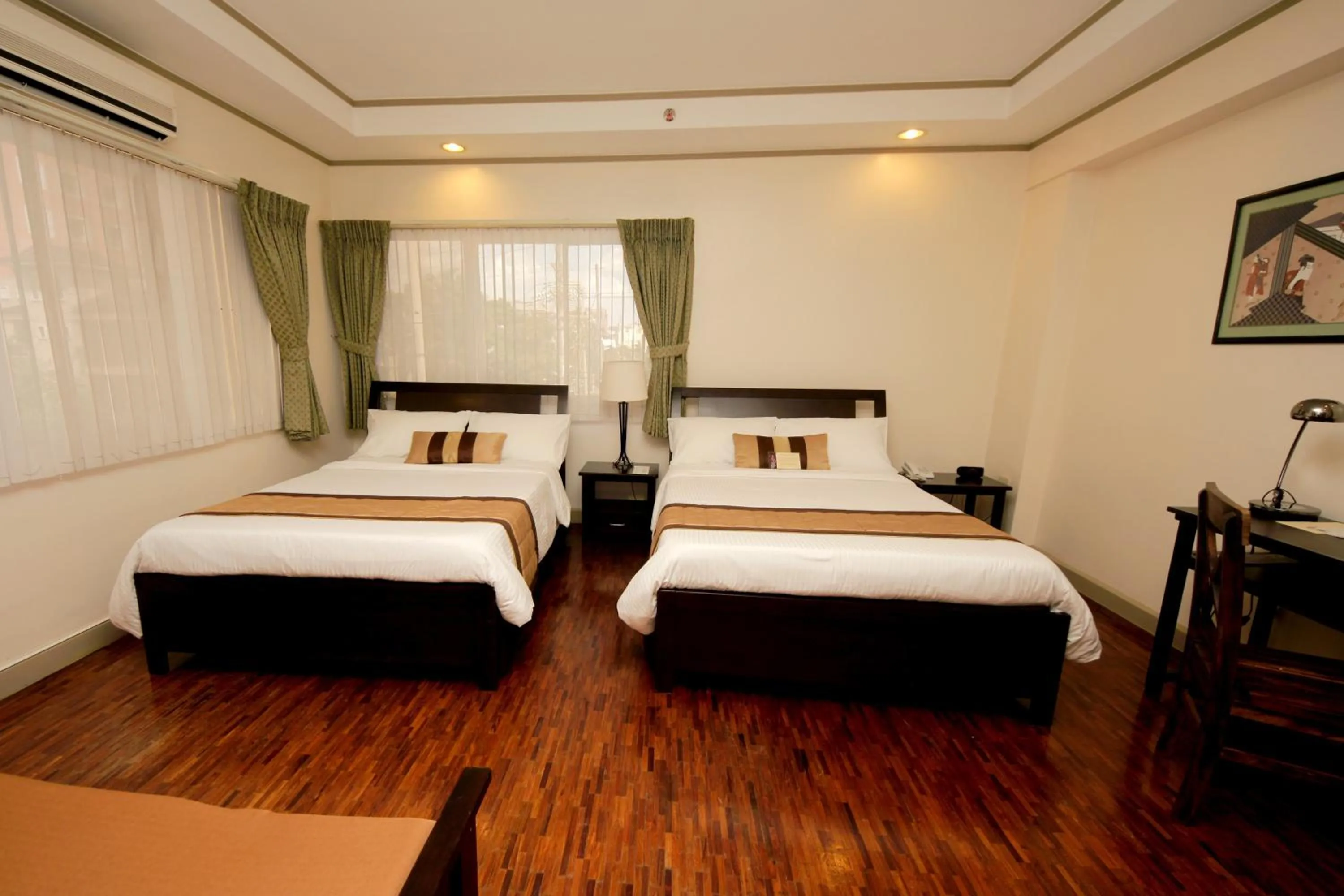 Seating area, Bed in Casa Pura Inn and Suites