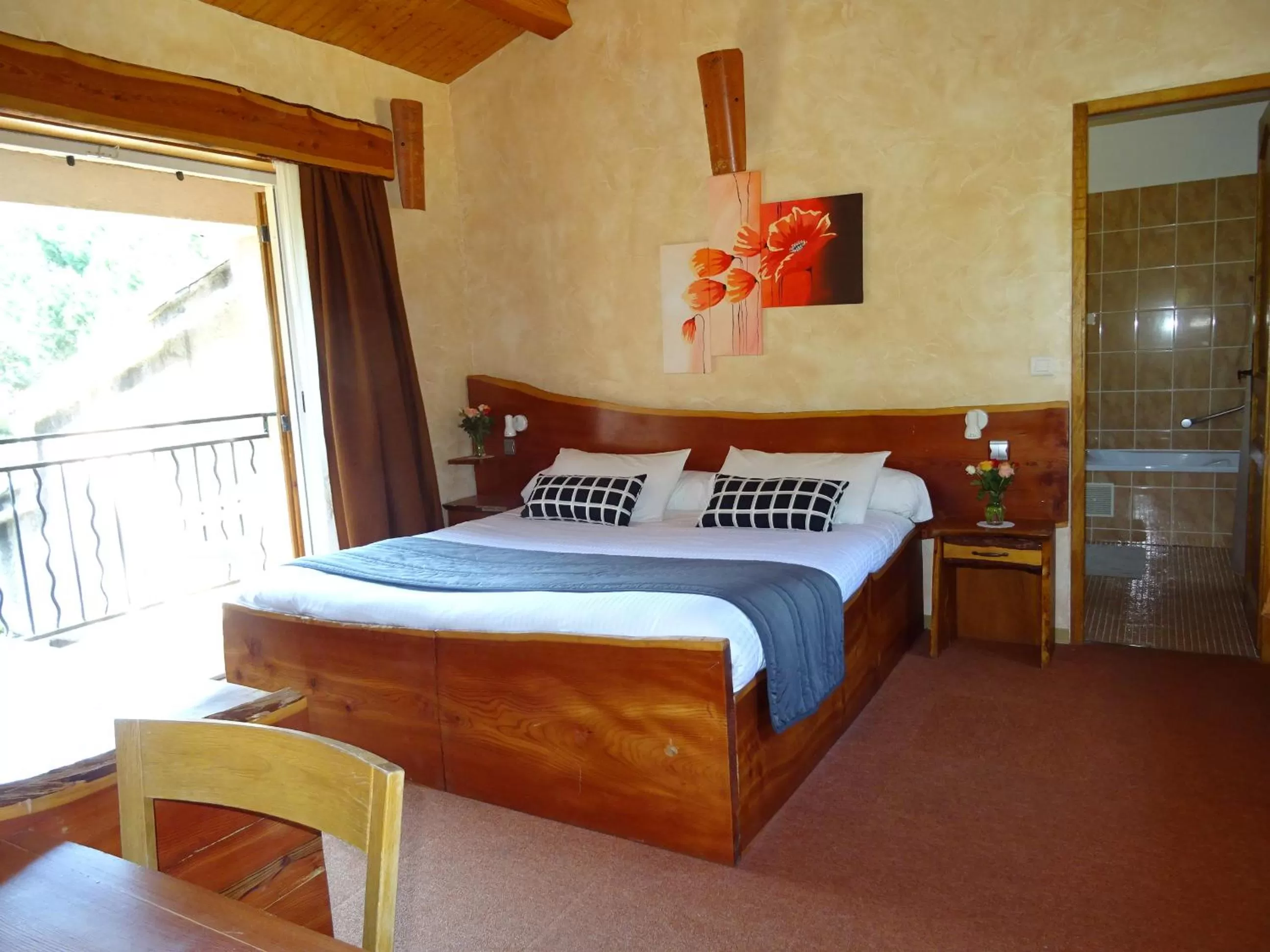 Bedroom in Les Chambres d'Hotes au Bois Fleuri