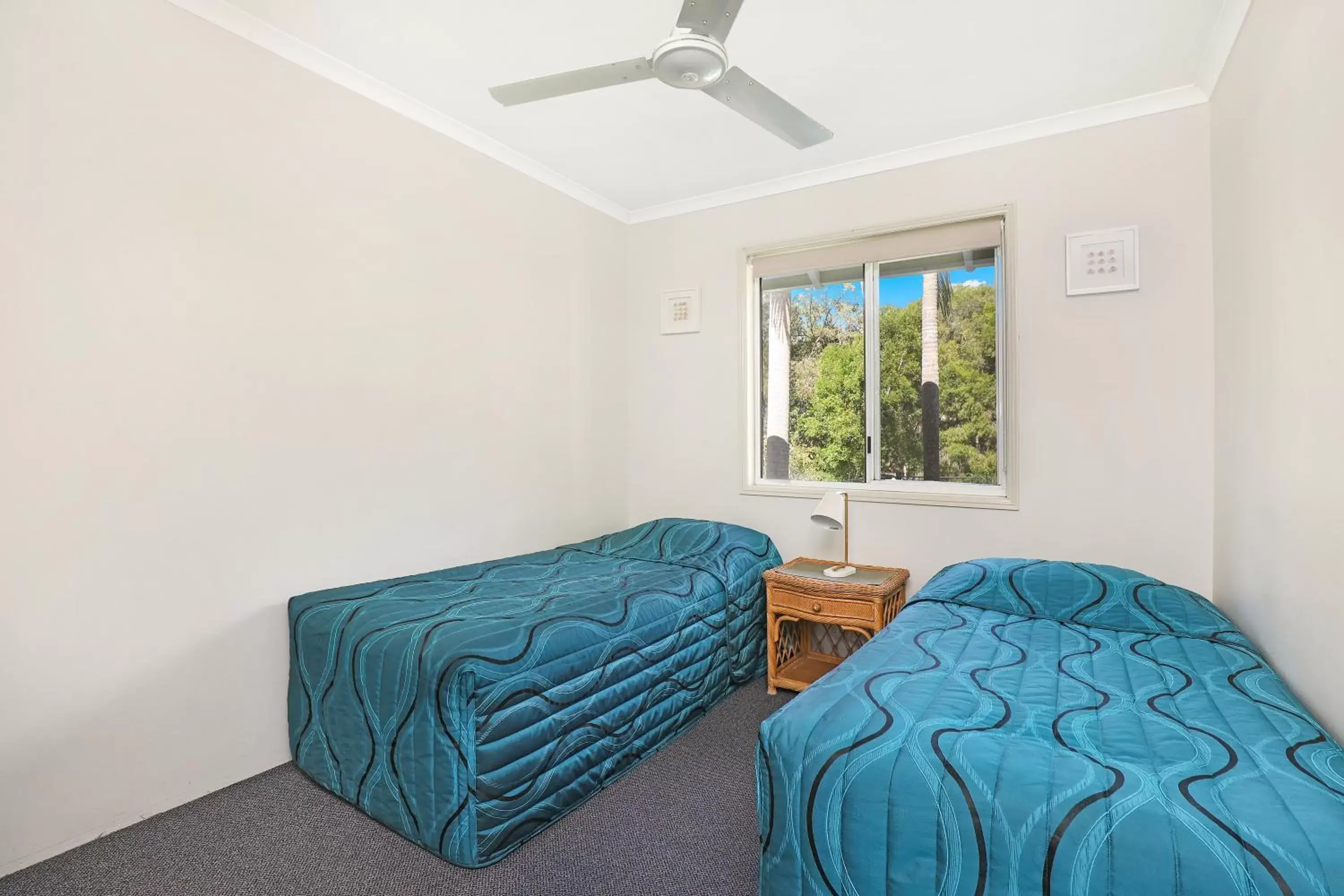 Bed in Coral Beach Noosa Resort