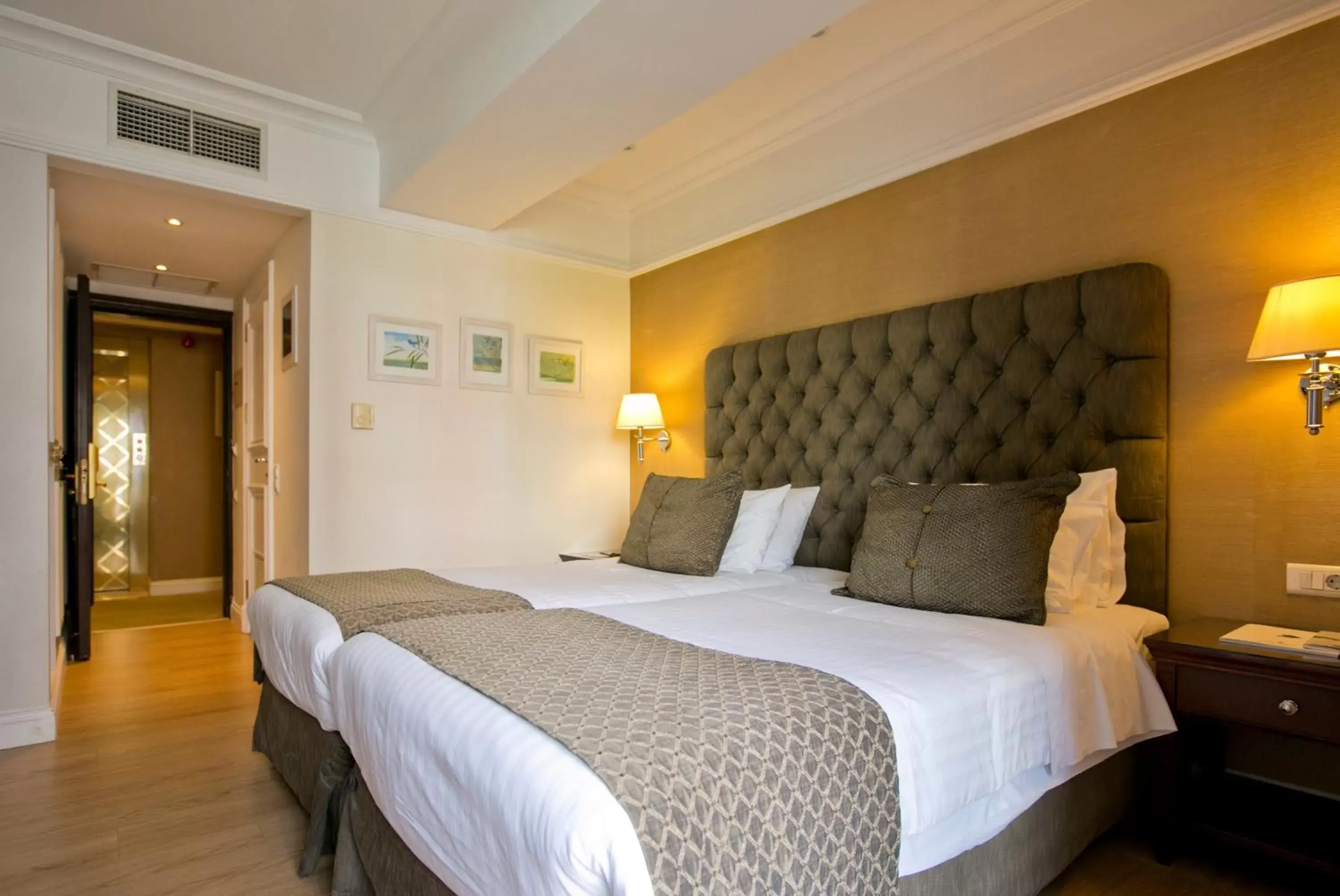 Bed in Hera Hotel