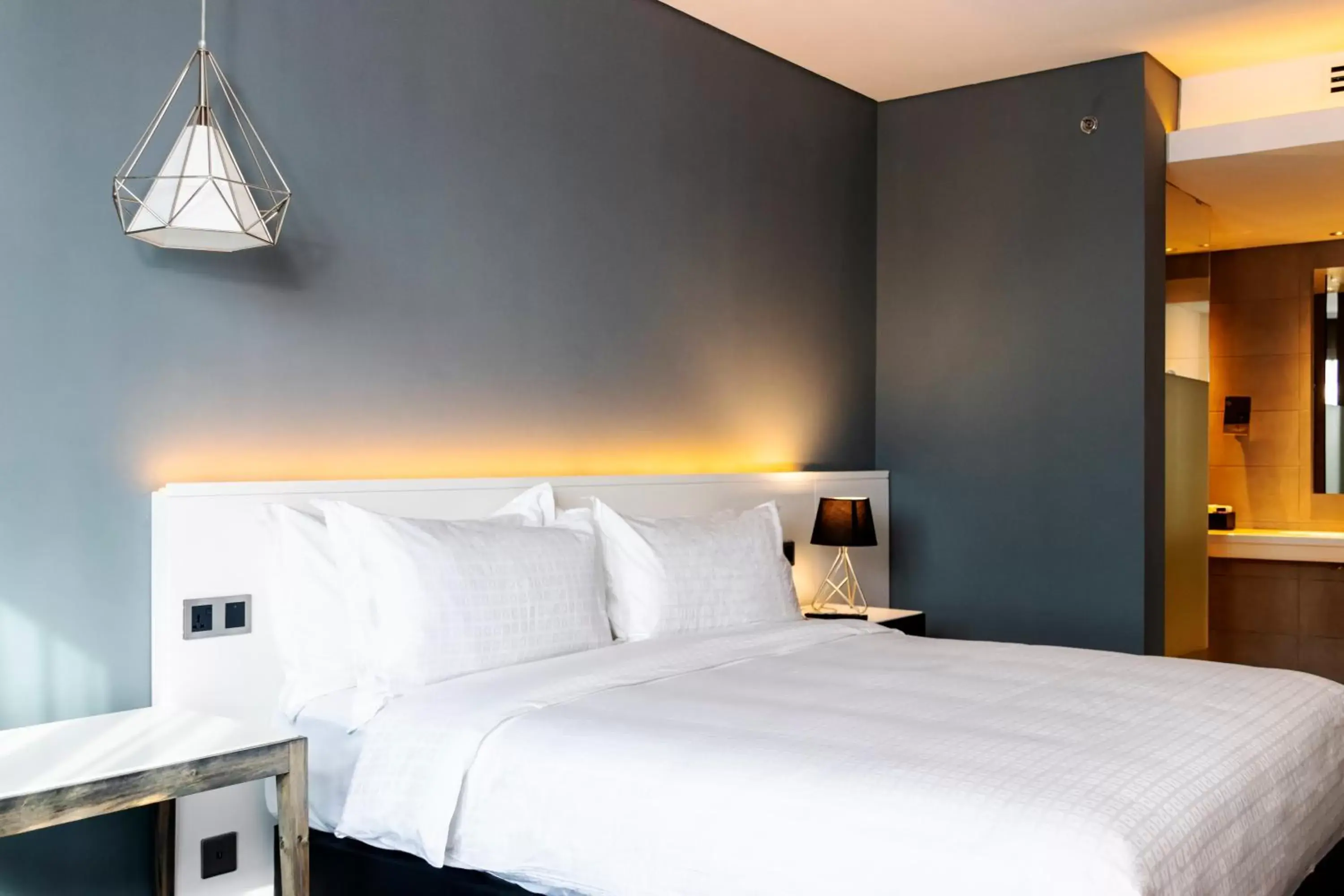 Bed in Trademark Hotel, a Member of Design Hotels