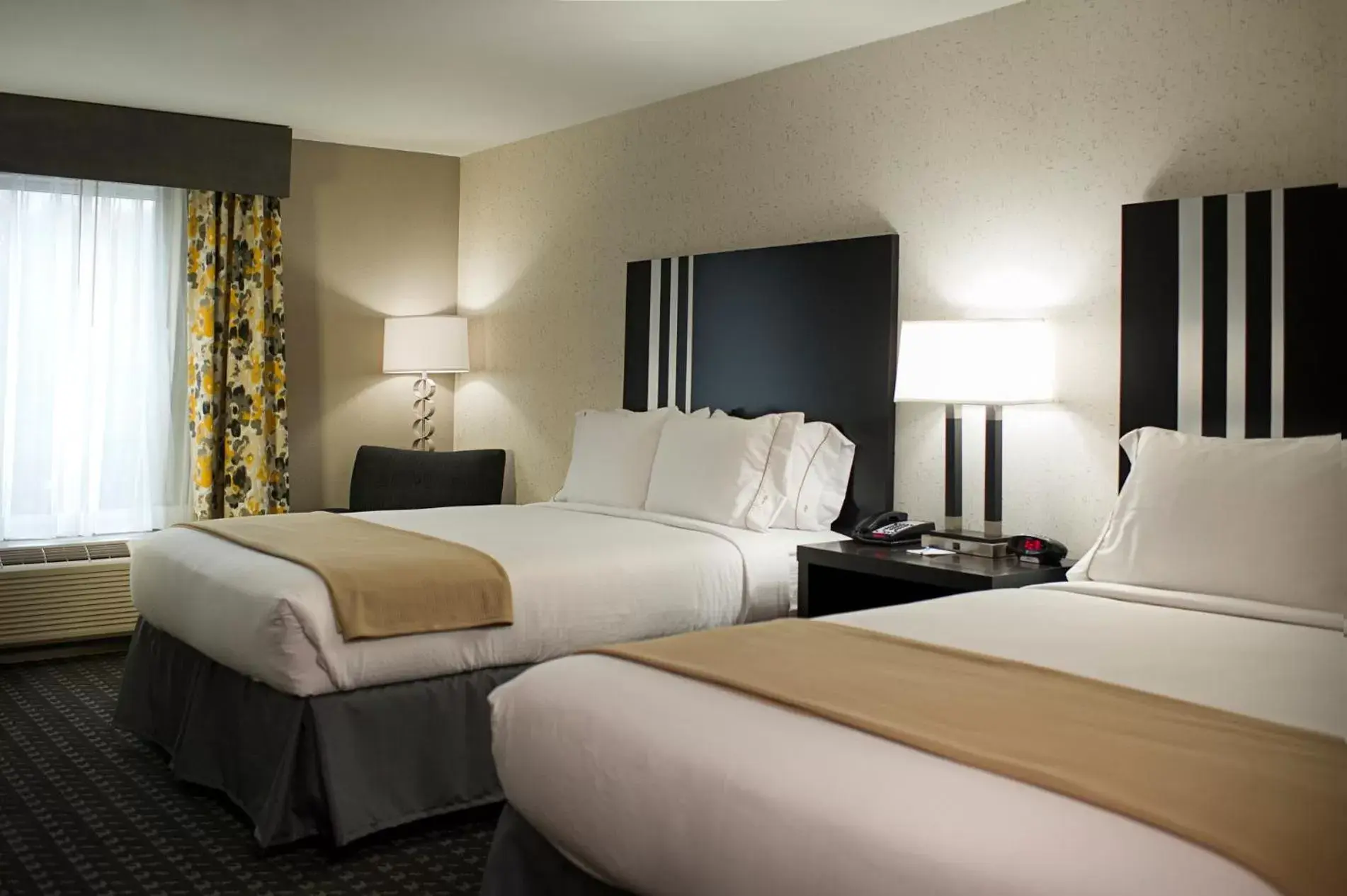 Bed in Holiday Inn Express and Suites Madison Central, an IHG Hotel