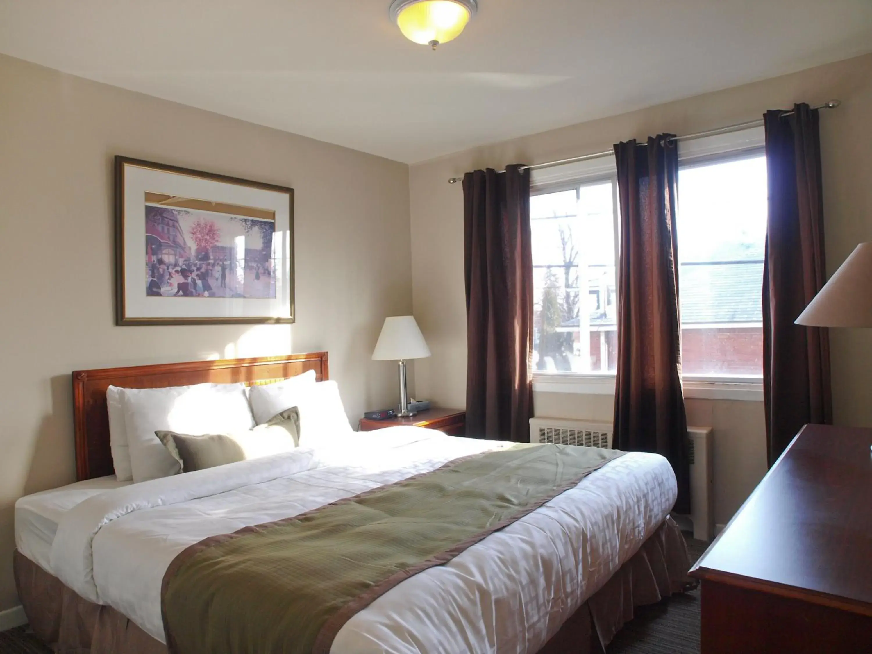 Bed in Beausejour Hotel Apartments/Hotel Dorval