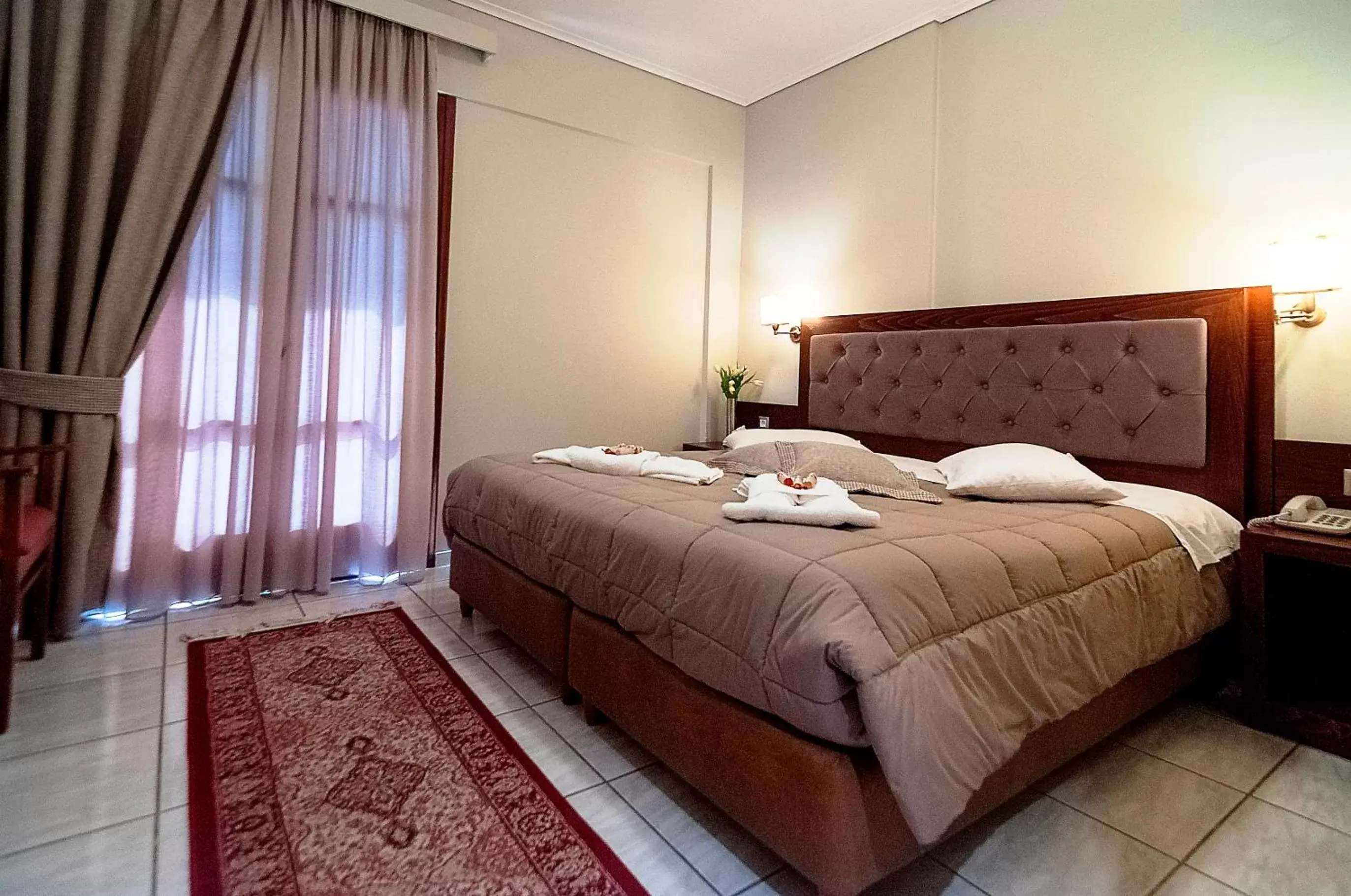 Bed in Fedriades Delphi Hotel