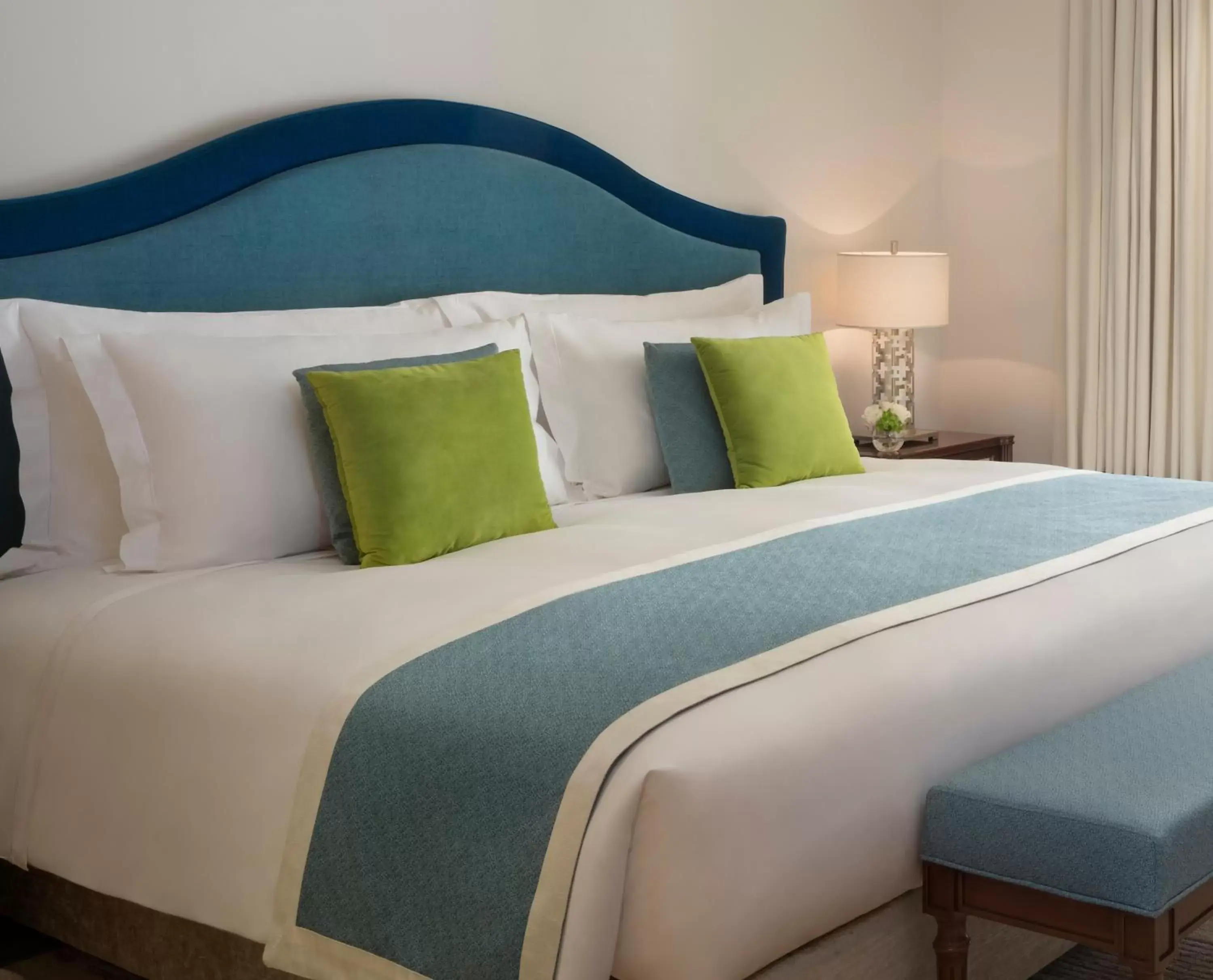 Bed in Al Najada Doha Hotel Apartments by Oaks