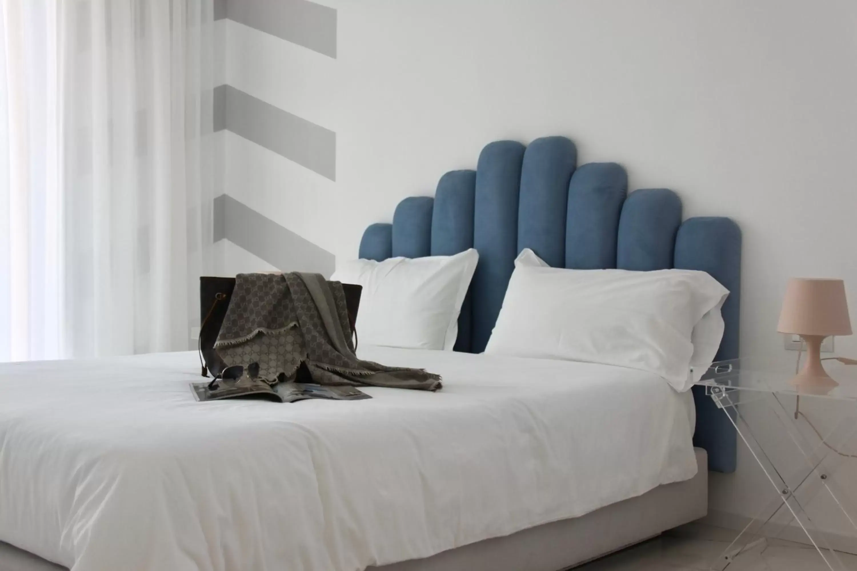 Bed in S'O Suites Tropea