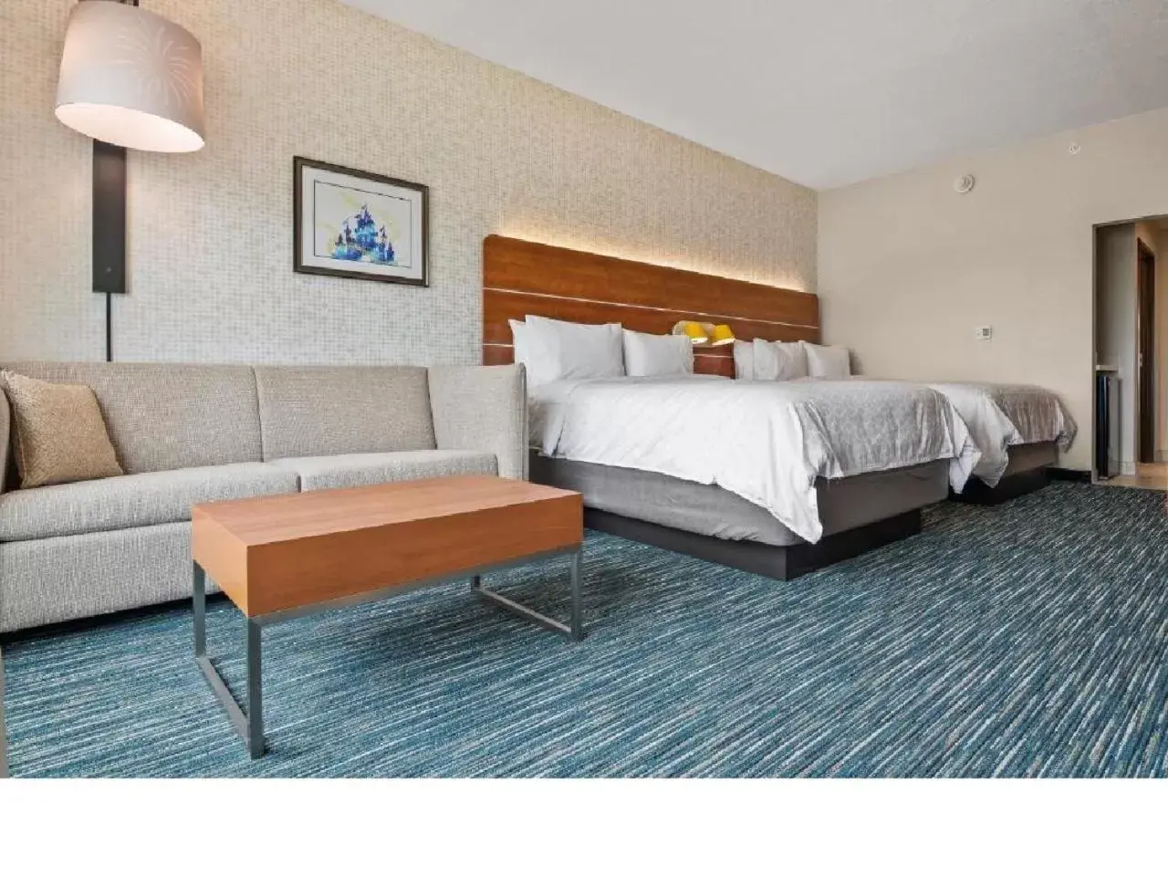 Bed in Holiday Inn Express & Suites Orlando- Lake Buena Vista, an IHG Hotel