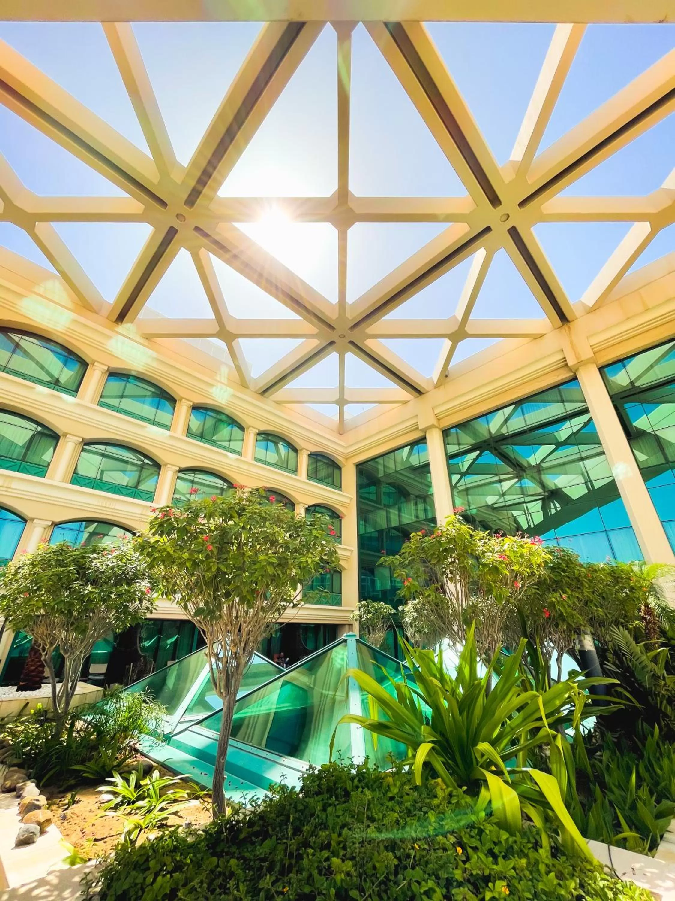 Garden view in Mövenpick Grand Al Bustan