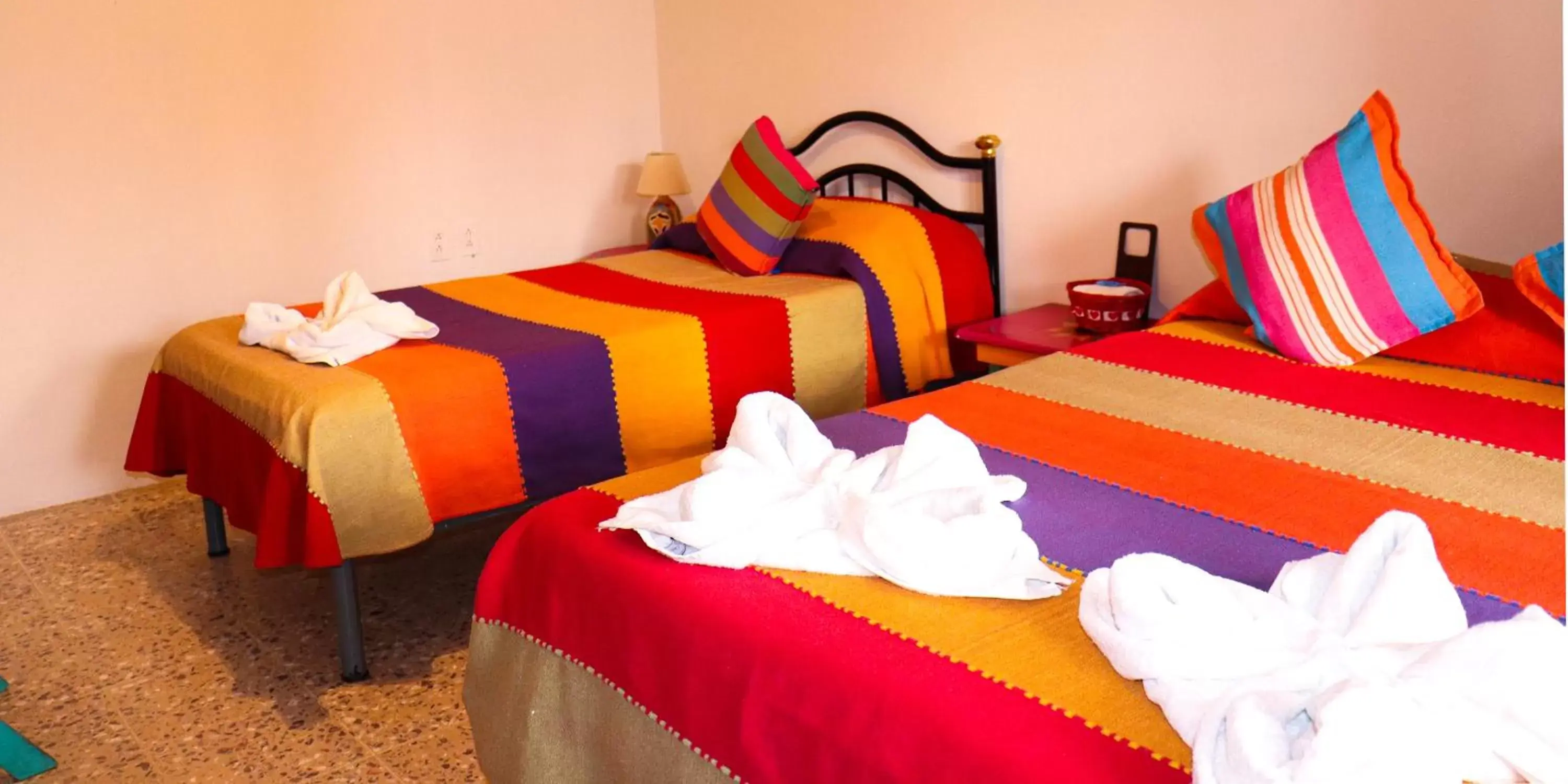 Area and facilities, Bed in Posada Don Mario