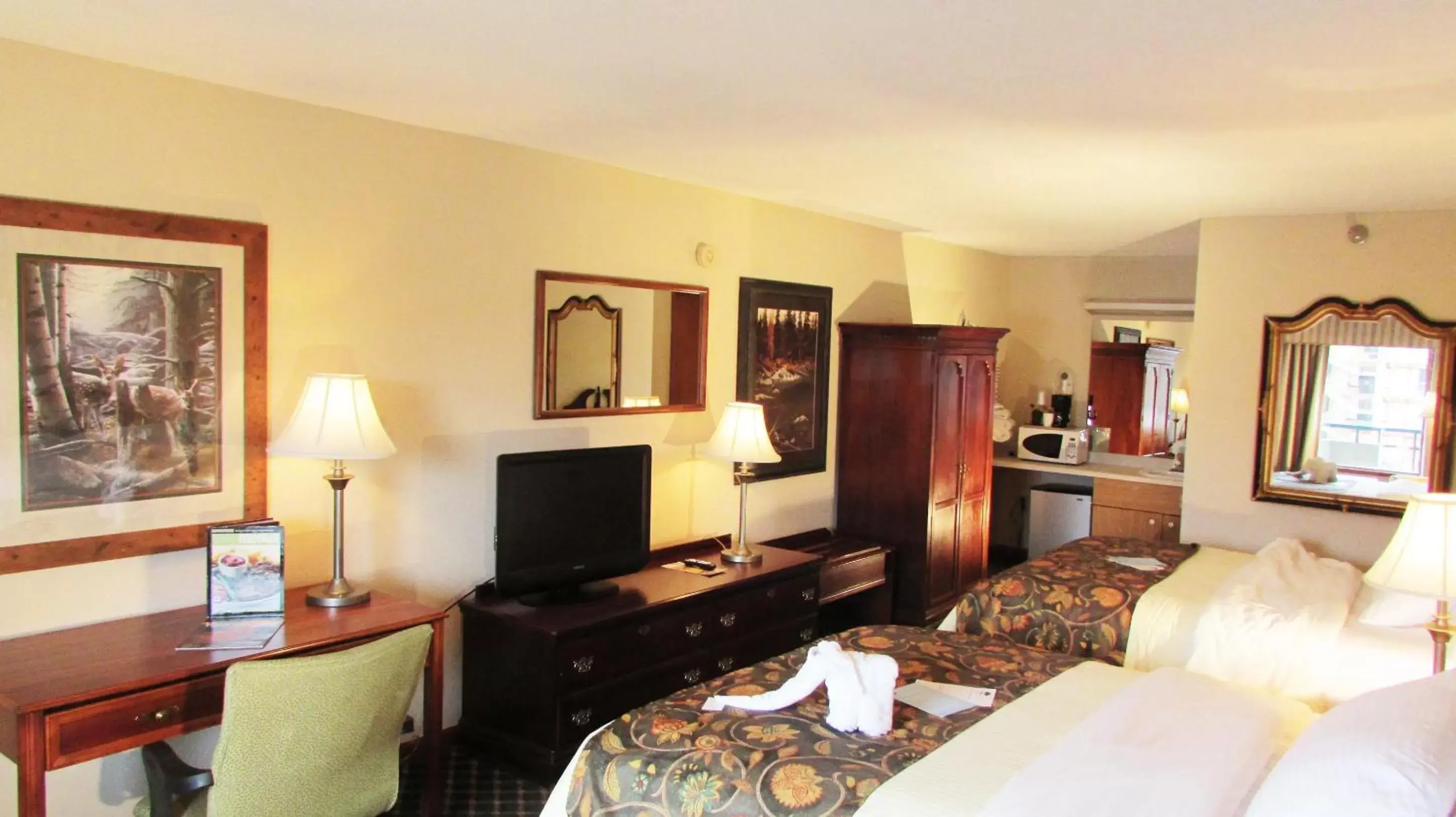 Classic Double Queen with Two Queen Beds with Shared Hall Balcony or Patio in Arbors at Island Landing Hotel & Suites