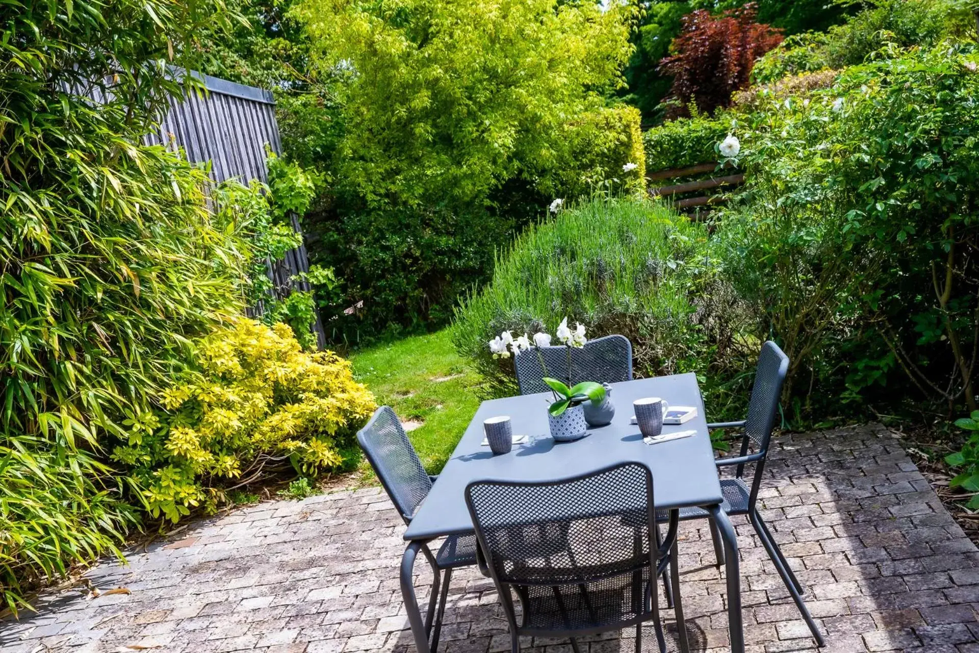 Patio in La Ferme de l'Oudon & SPA