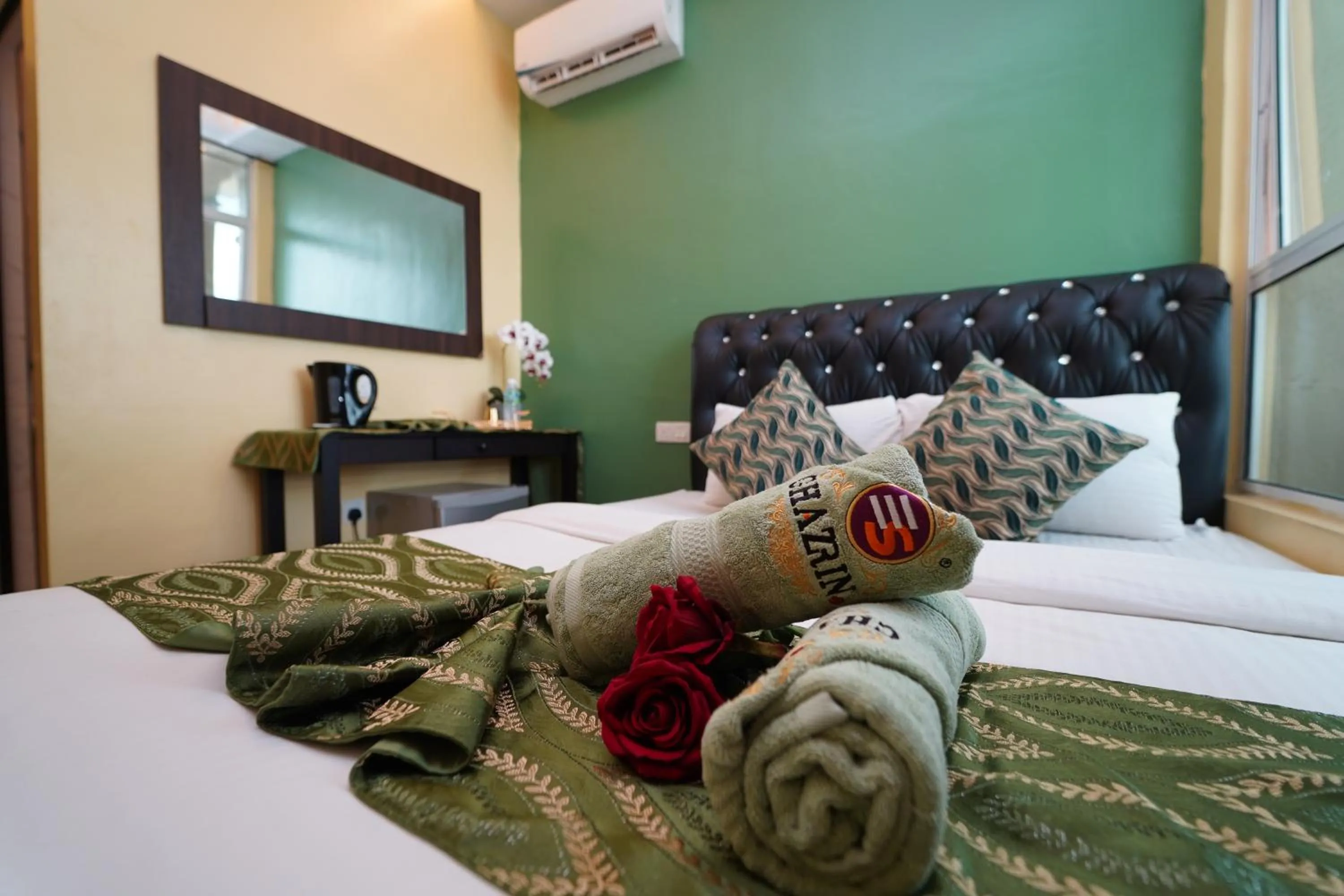 Bed in Ghazrin's Classic Hotel JB