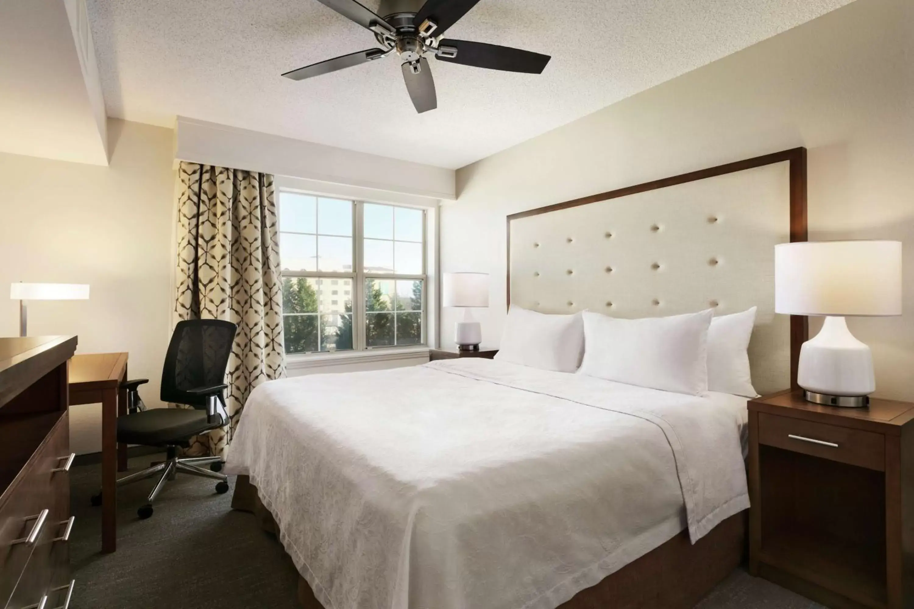 Bed in Homewood Suites by Hilton Kansas City Airport