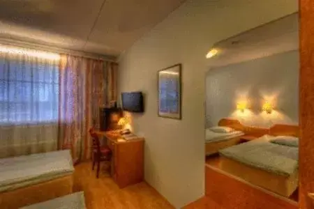 Bed in Hotel Mestarin Kievari