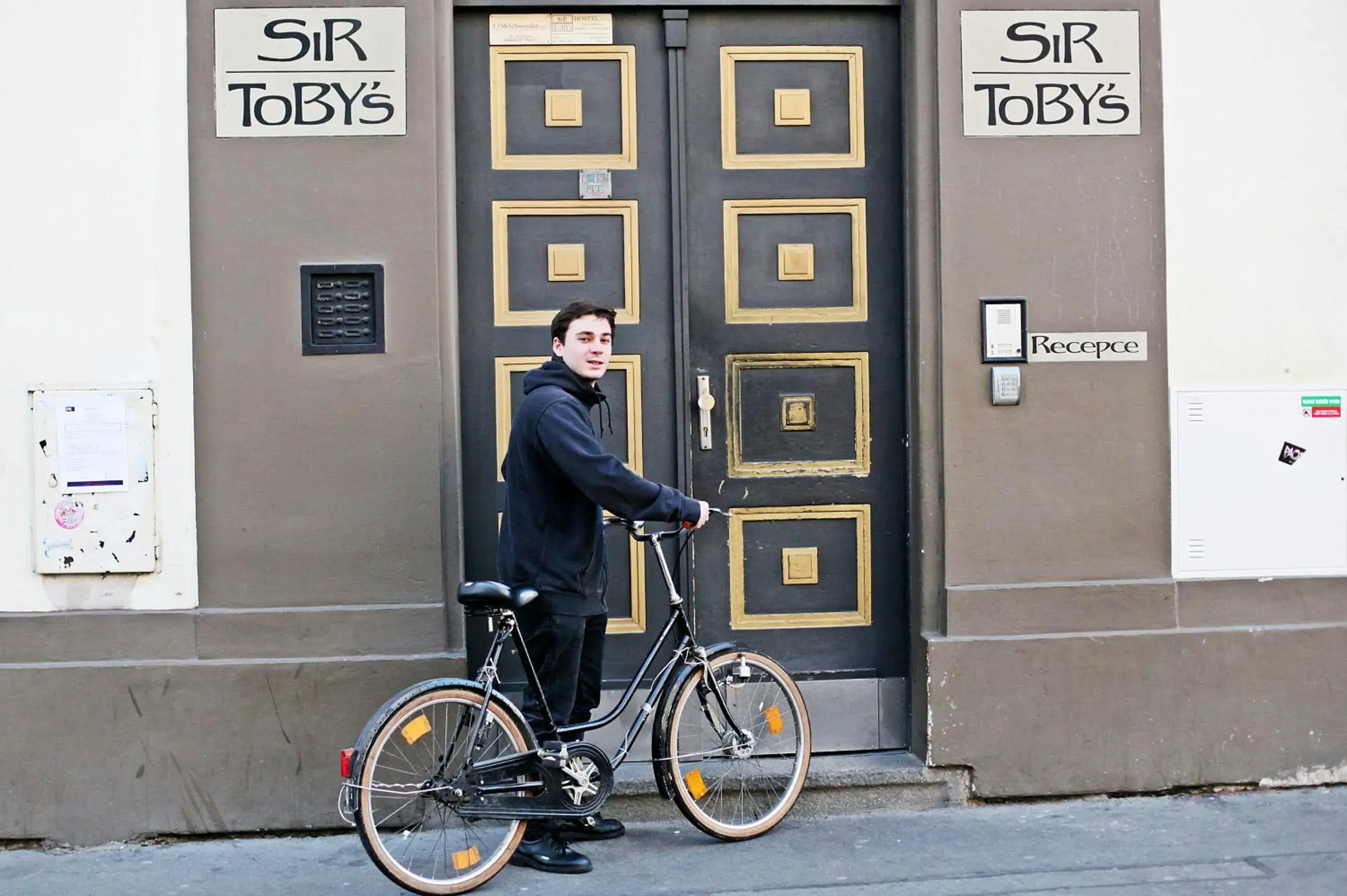 Facade/entrance, Biking in Sir Toby's Hostel