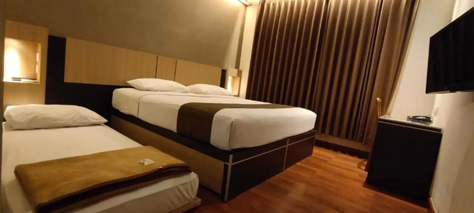Bed in Sukajadi Hotel, Convention and Gallery