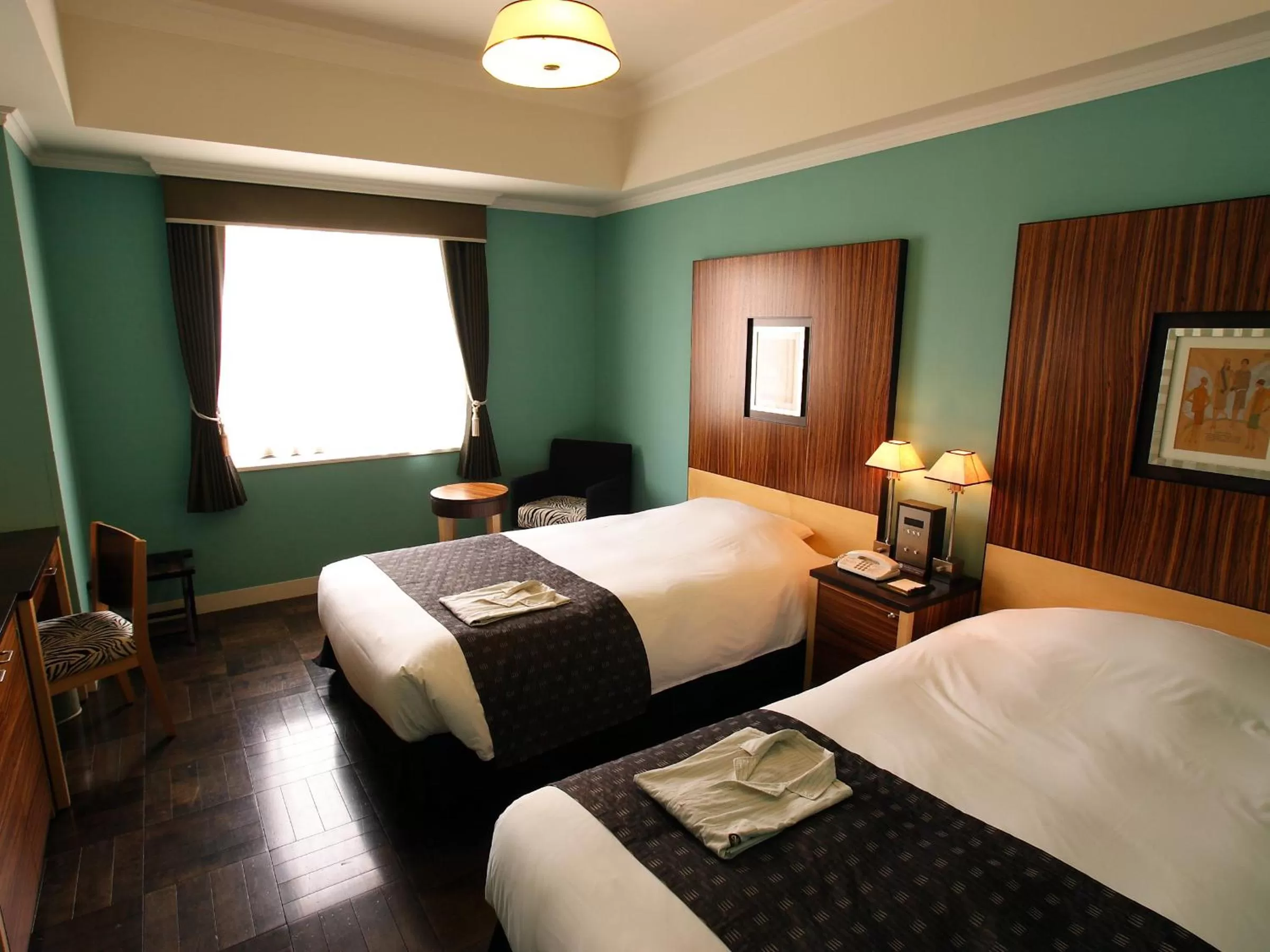 Photo of the whole room, Bed in Hotel Monterey La Soeur Fukuoka