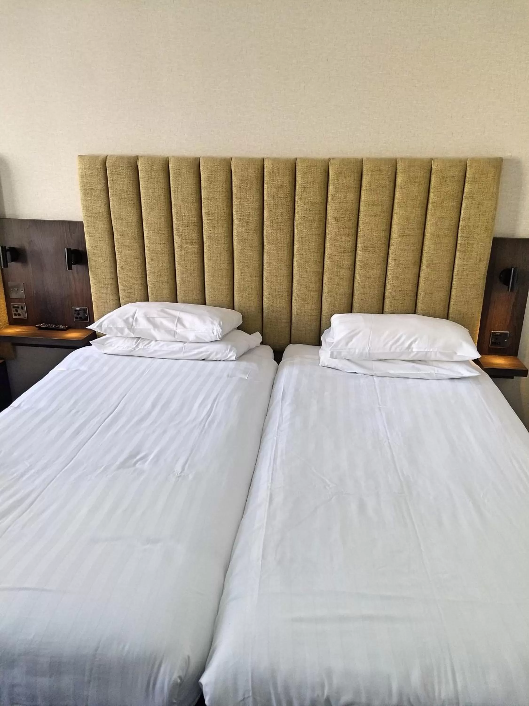 Bed in Garden Court Hotel