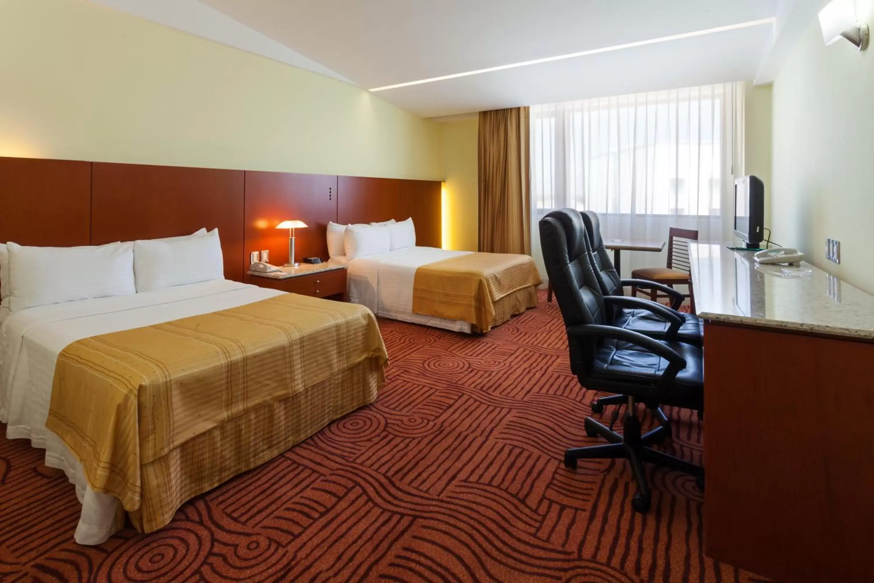 Photo of the whole room, Bed in Holiday Inn Puebla Finsa, an IHG Hotel