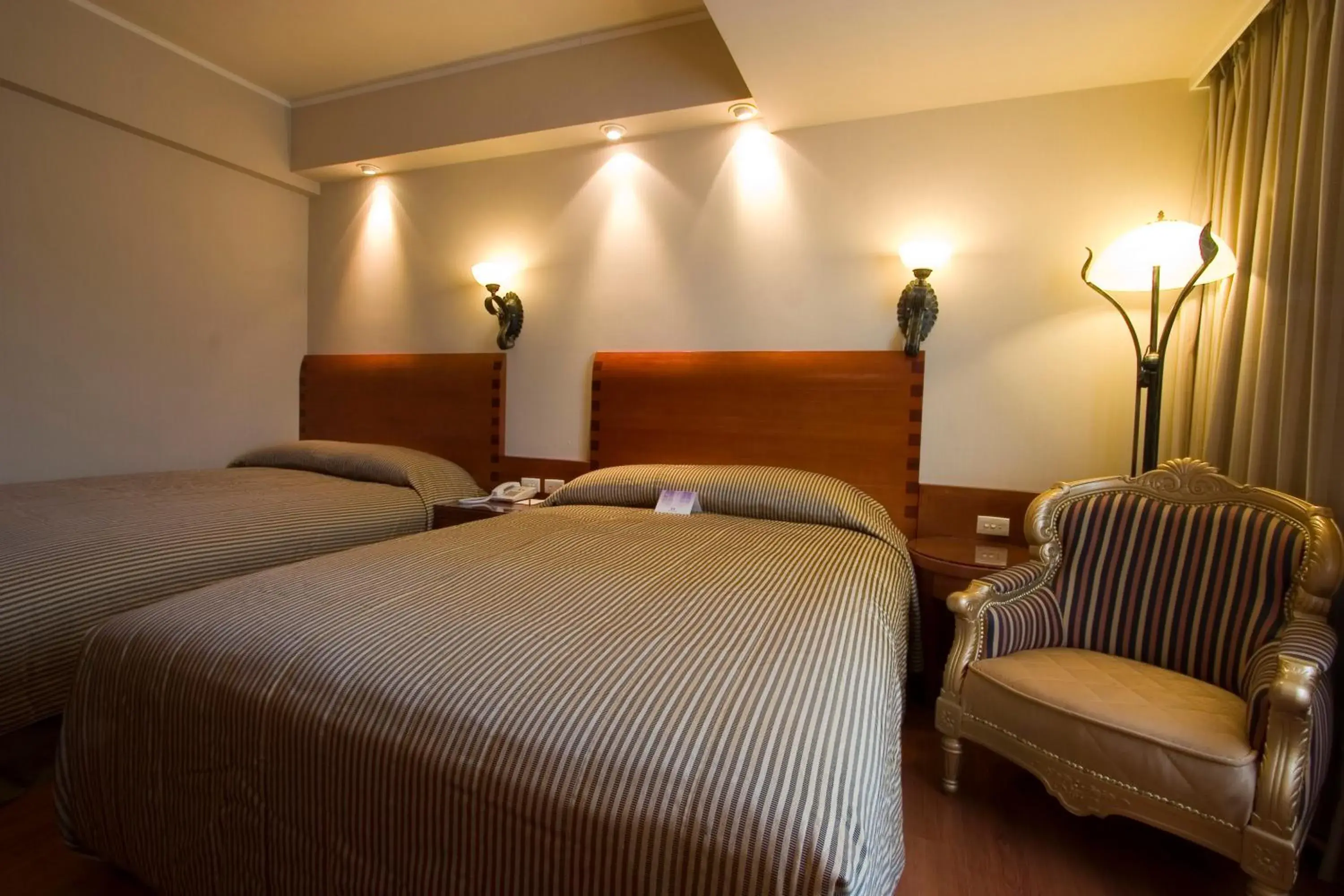 Bed in Charming City Hotel Hualien