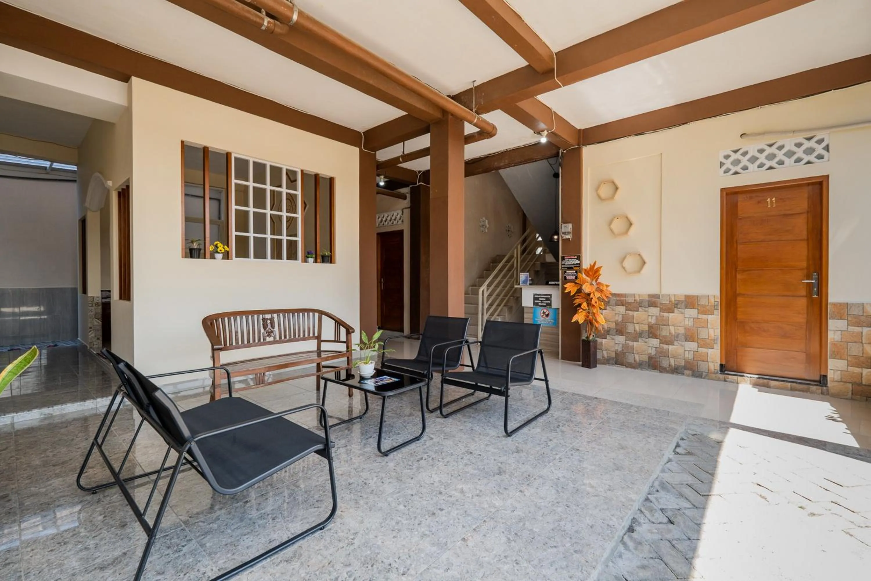 Seating area in RedDoorz Syariah near Batu Night Spectacular