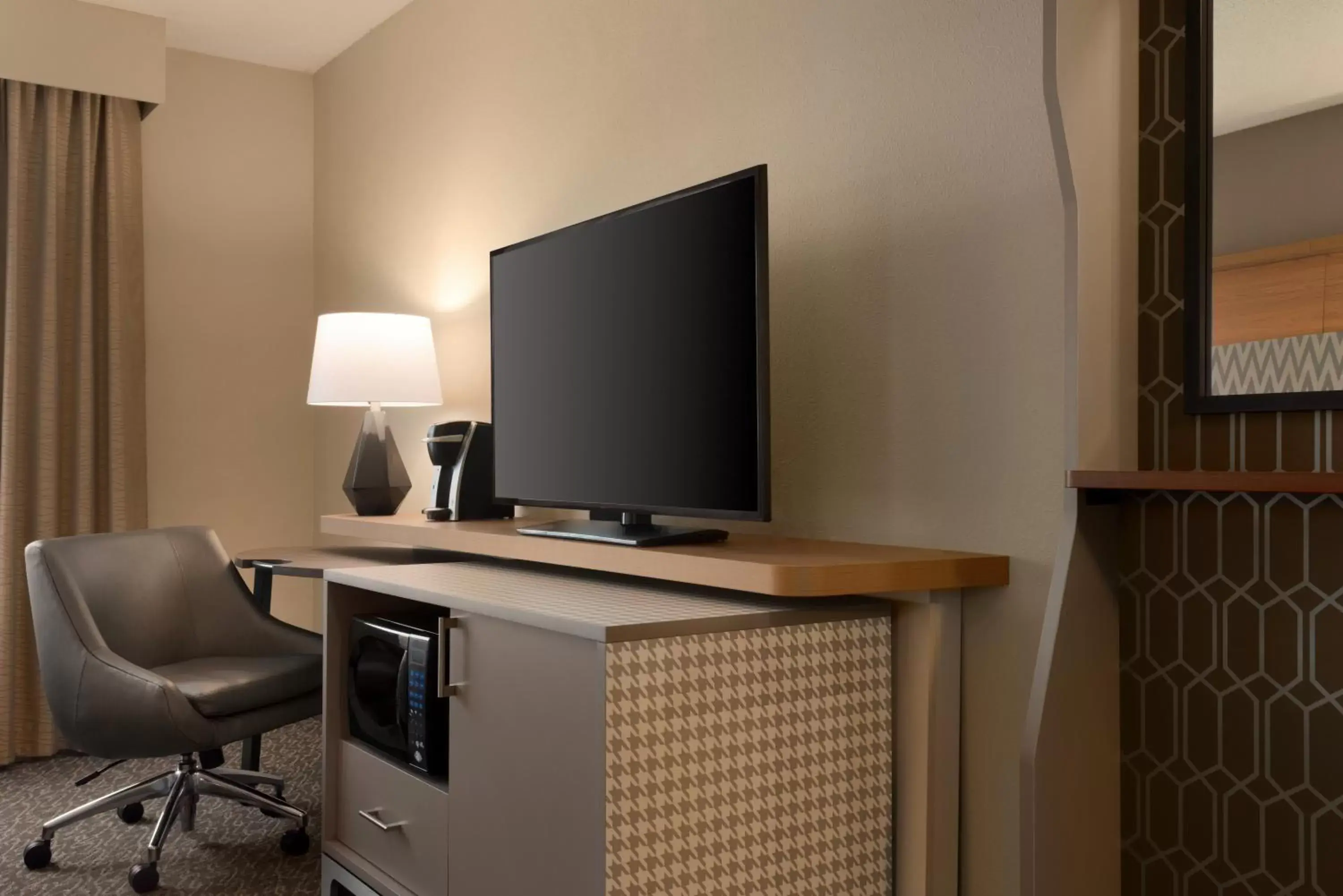 Photo of the whole room, TV/Entertainment Center in Holiday Inn Hotel & Suites Council Bluffs, an IHG Hotel