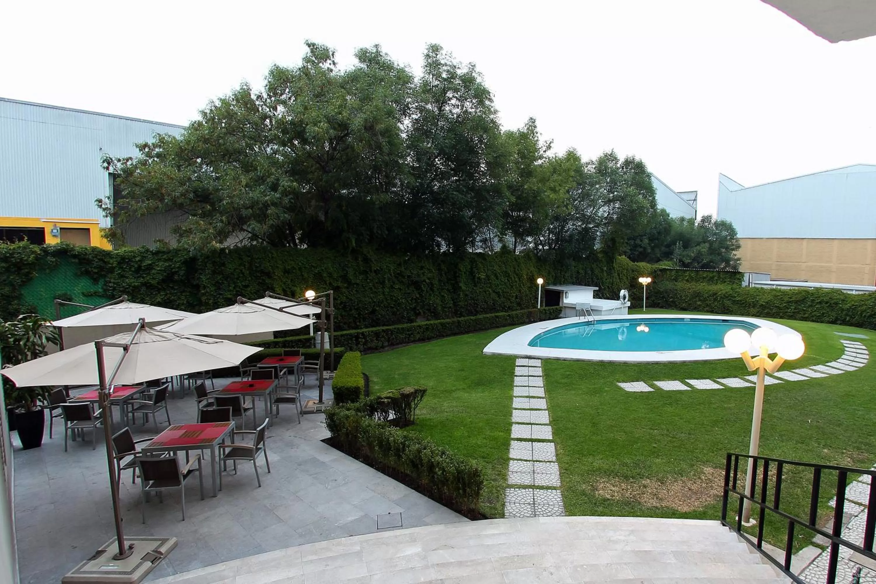 Swimming pool in Fiesta Inn Express Perinorte