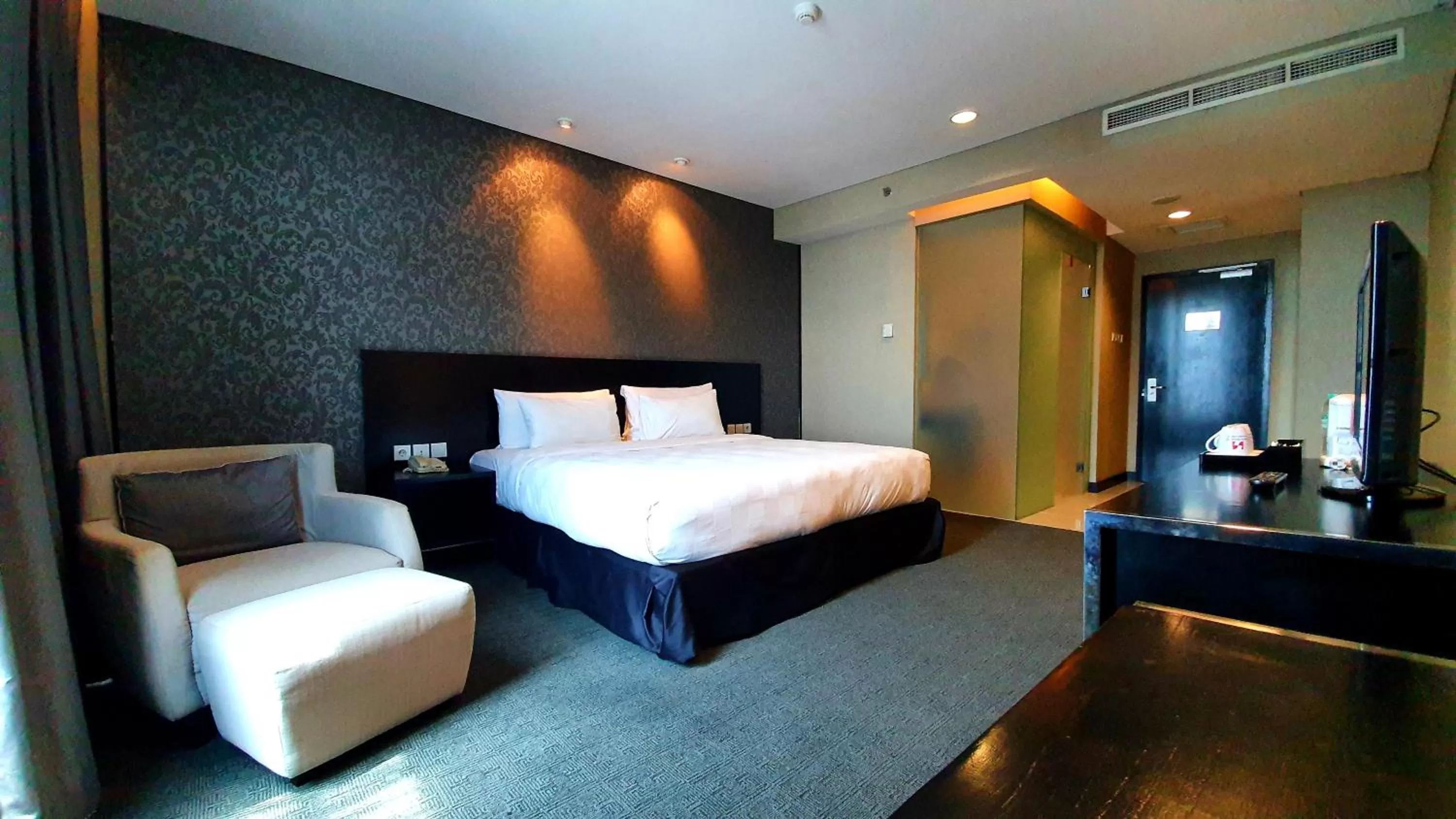 Bed in Swiss-Belhotel Mangga Besar