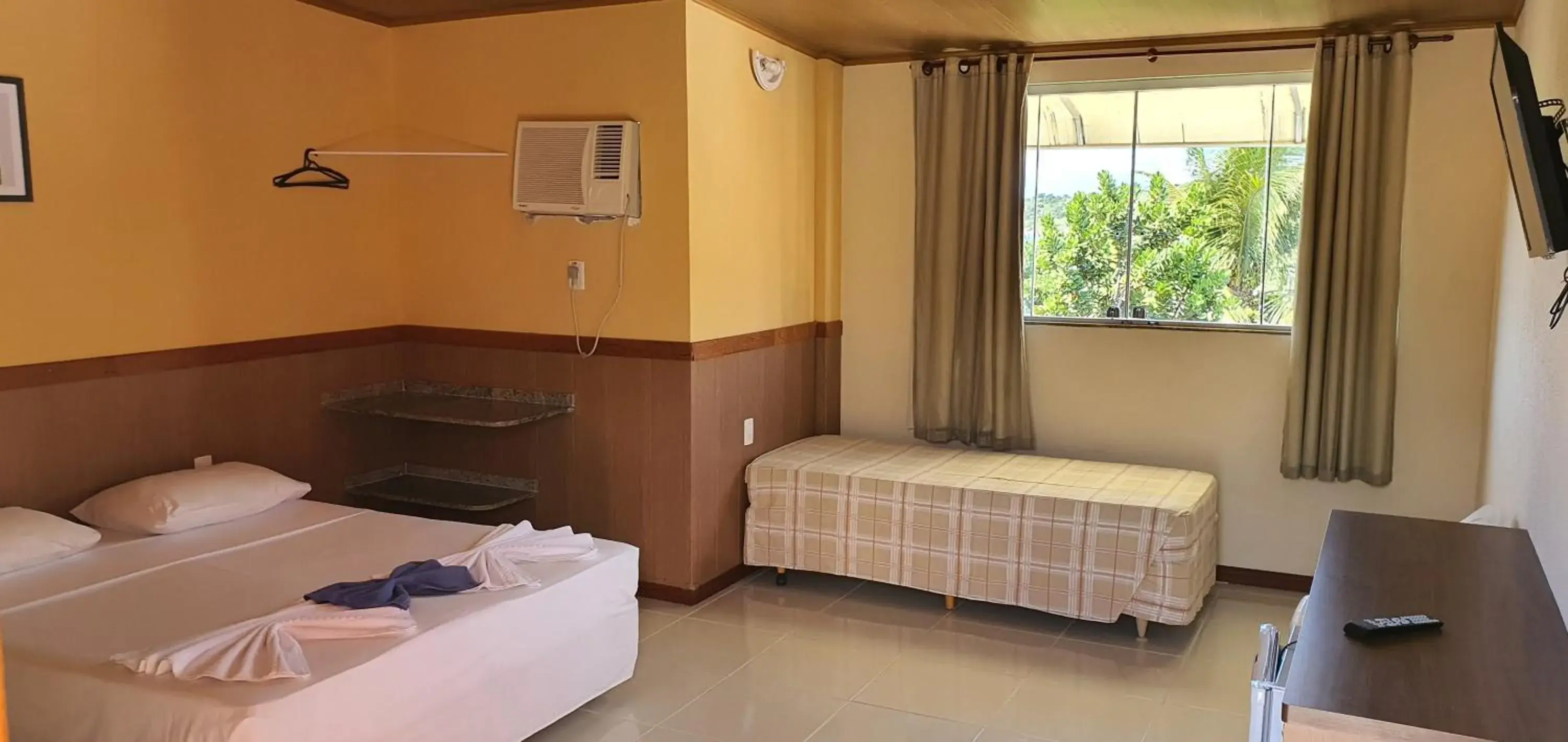 Photo of the whole room, Bed in Duas Praias Hotel Pousada