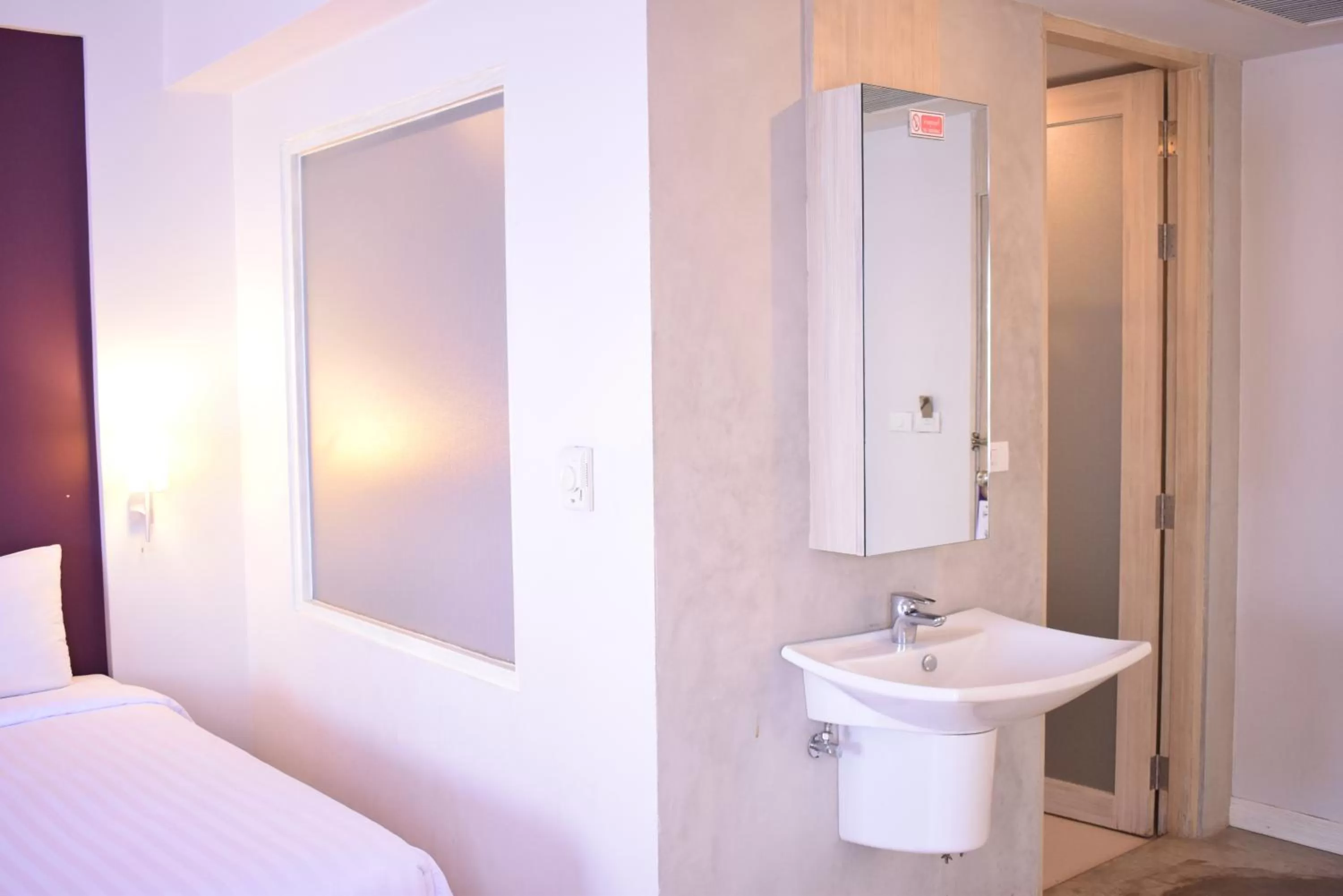 Bed in Trang Hotel Bangkok - SHA Plus