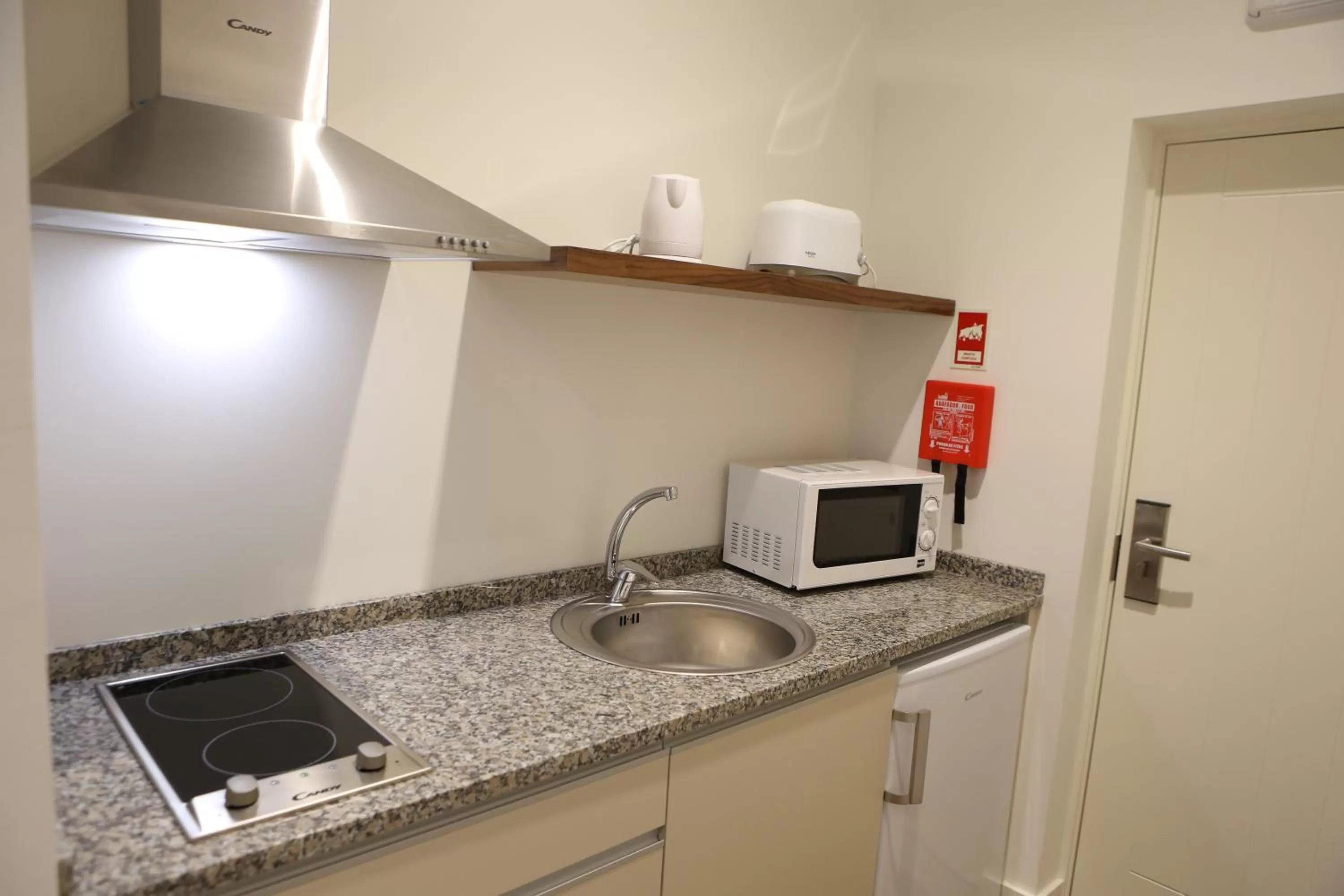 Kitchen or kitchenette in Hotel Solar do Rebolo