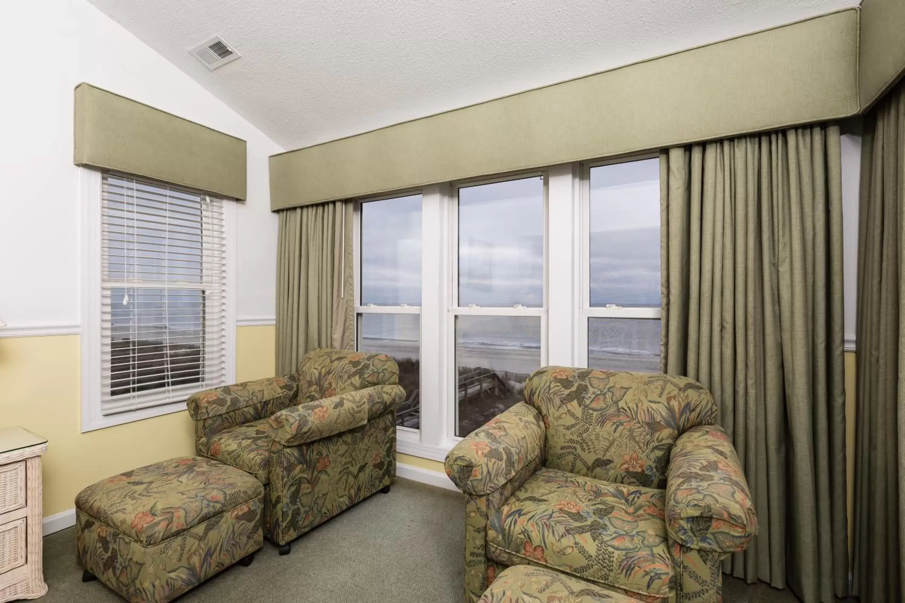 Living room, Seating Area in A Place at the Beach by Capital Vacations
