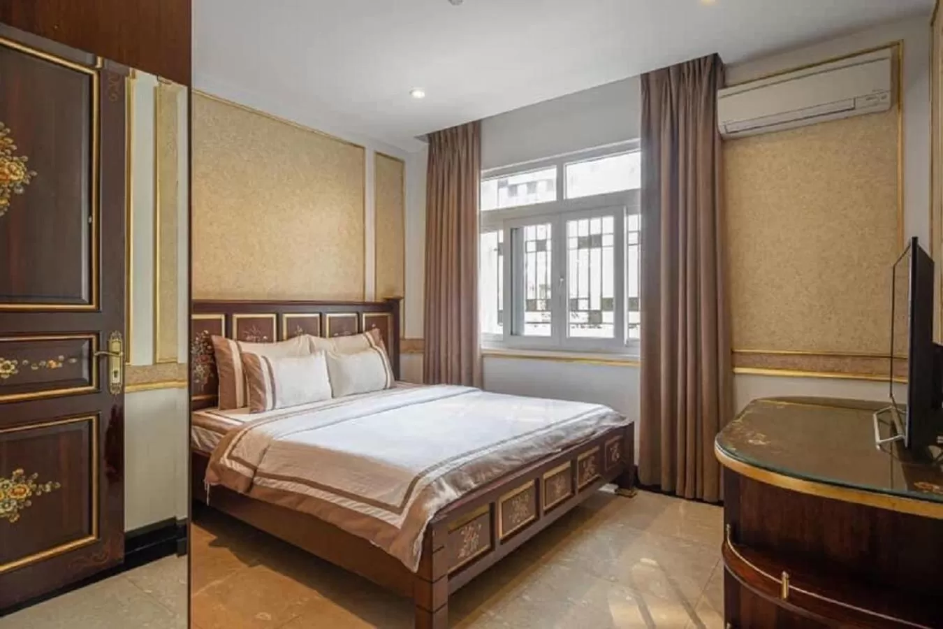 Bed in 345AB Sai Gon Hotel