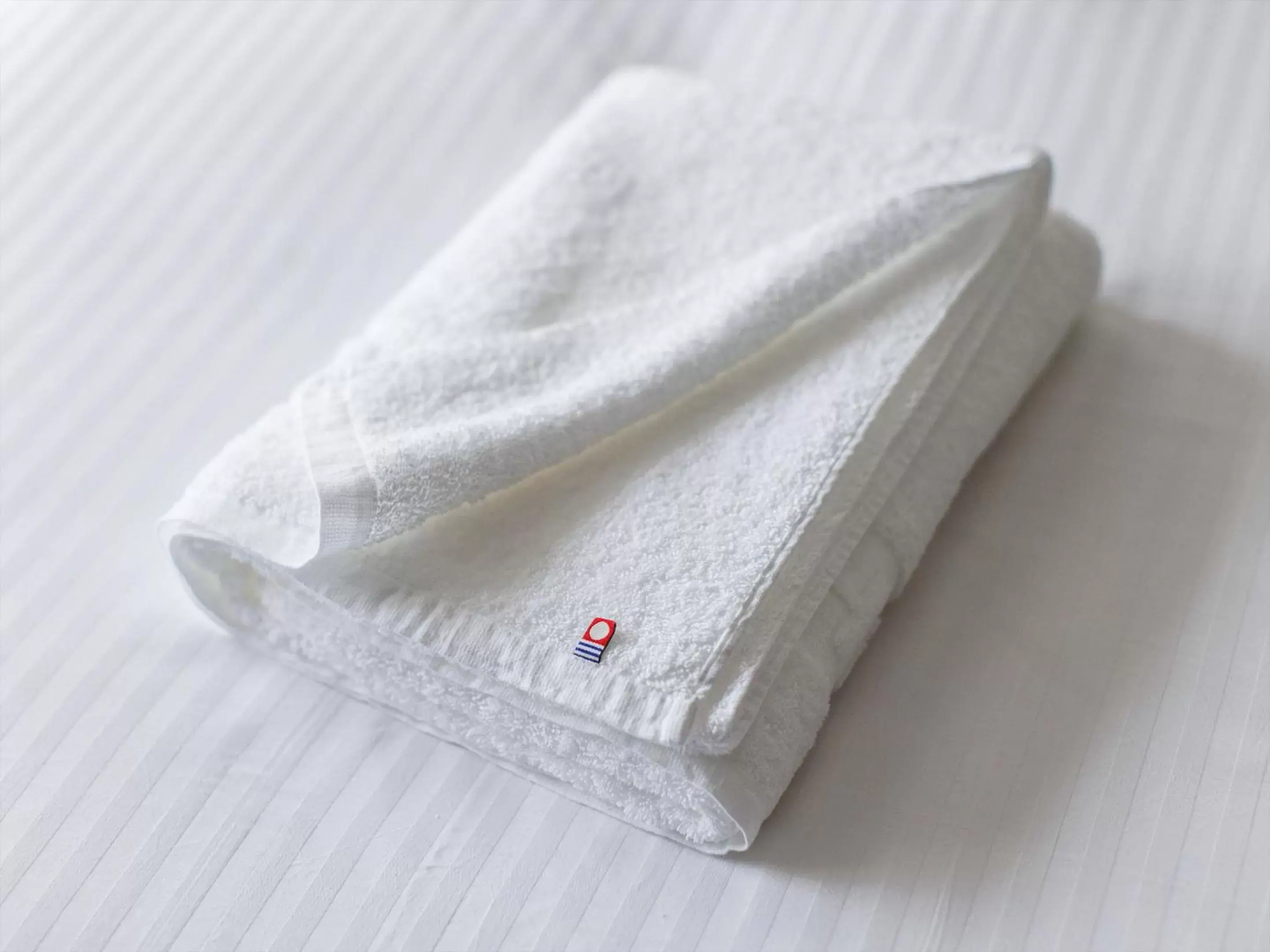 towels, Bed in THE BLOSSOM KUMAMOTO