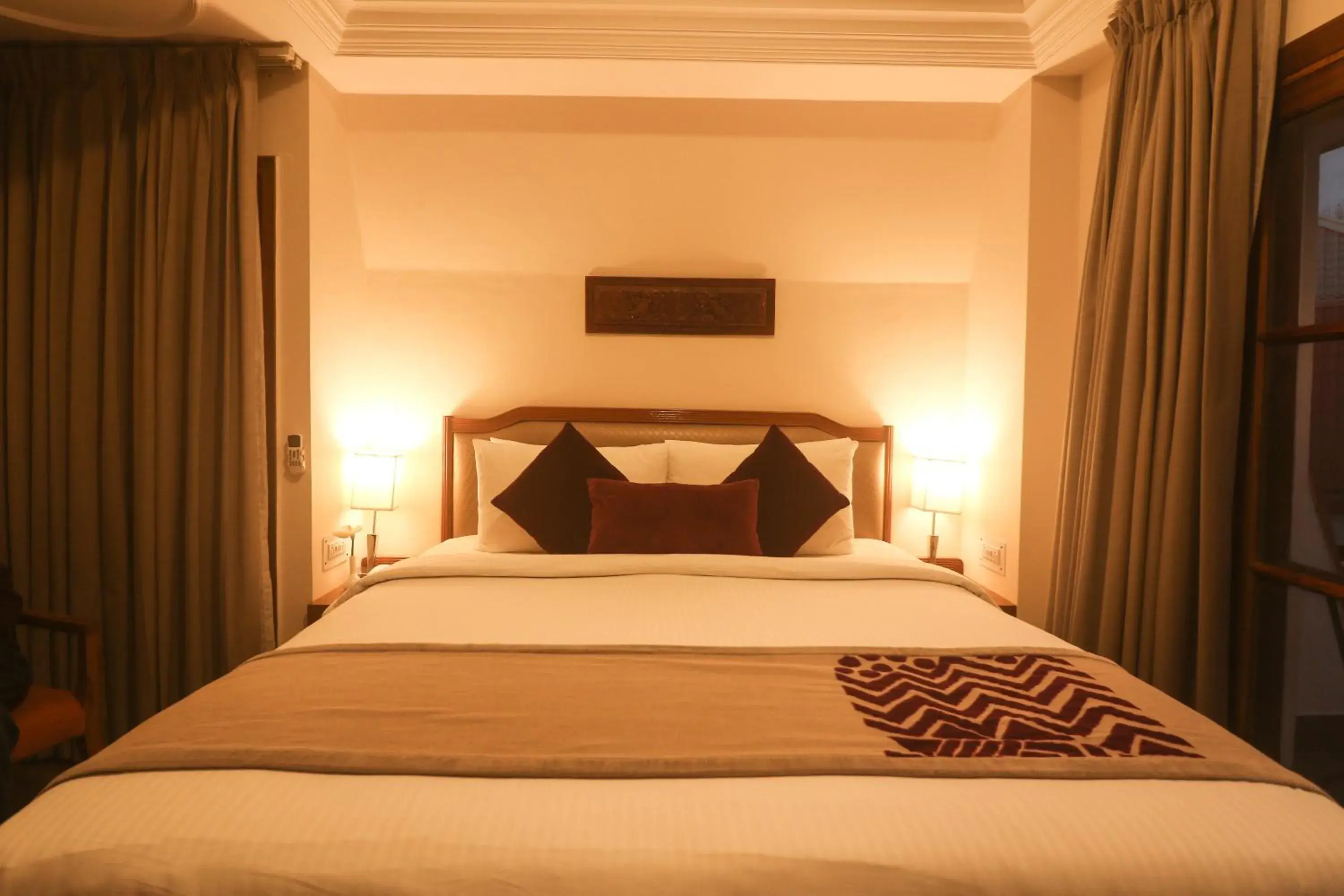 Bed in Marigold Sarovar Portico Shimla