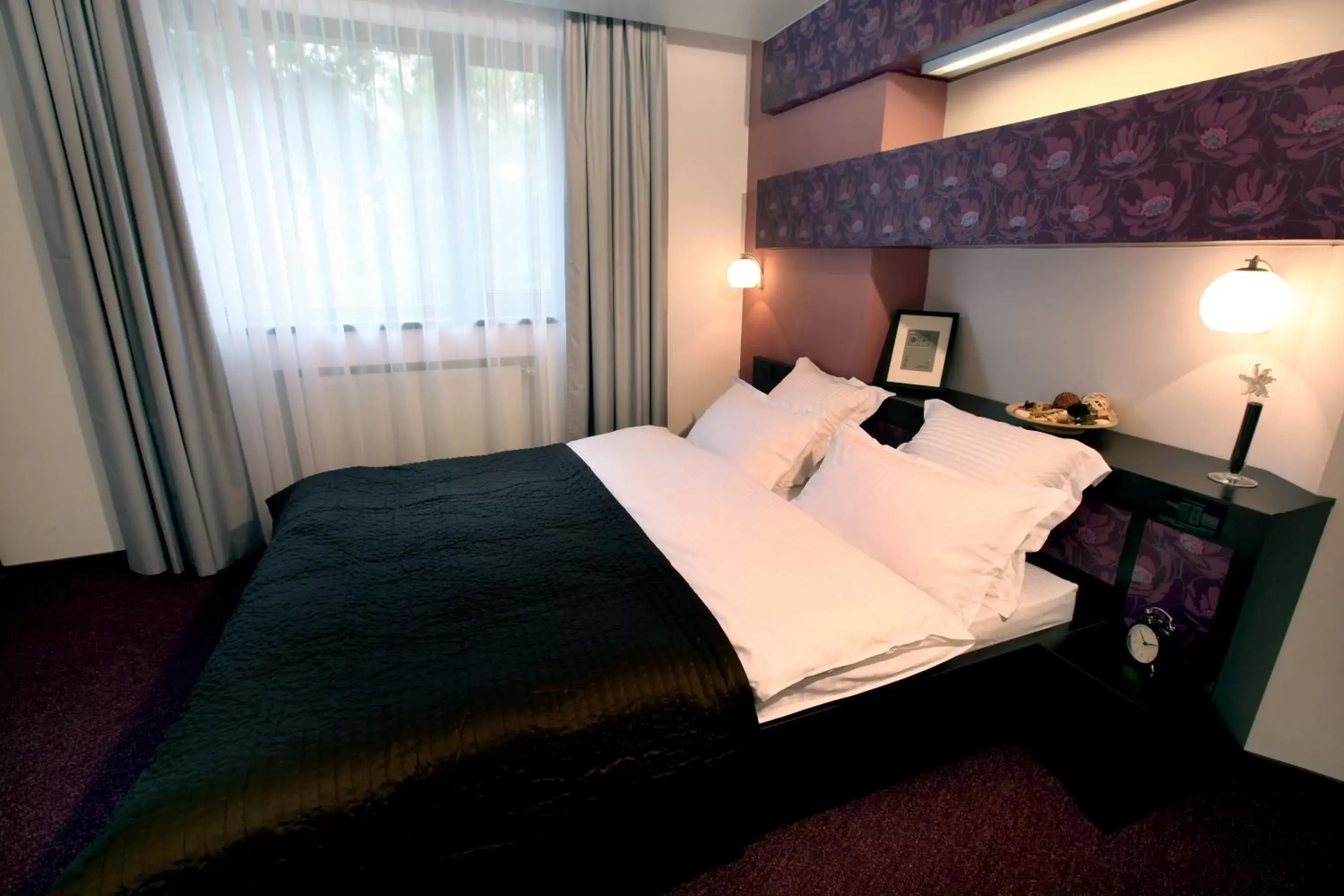 Bed in Ambiance Hotel
