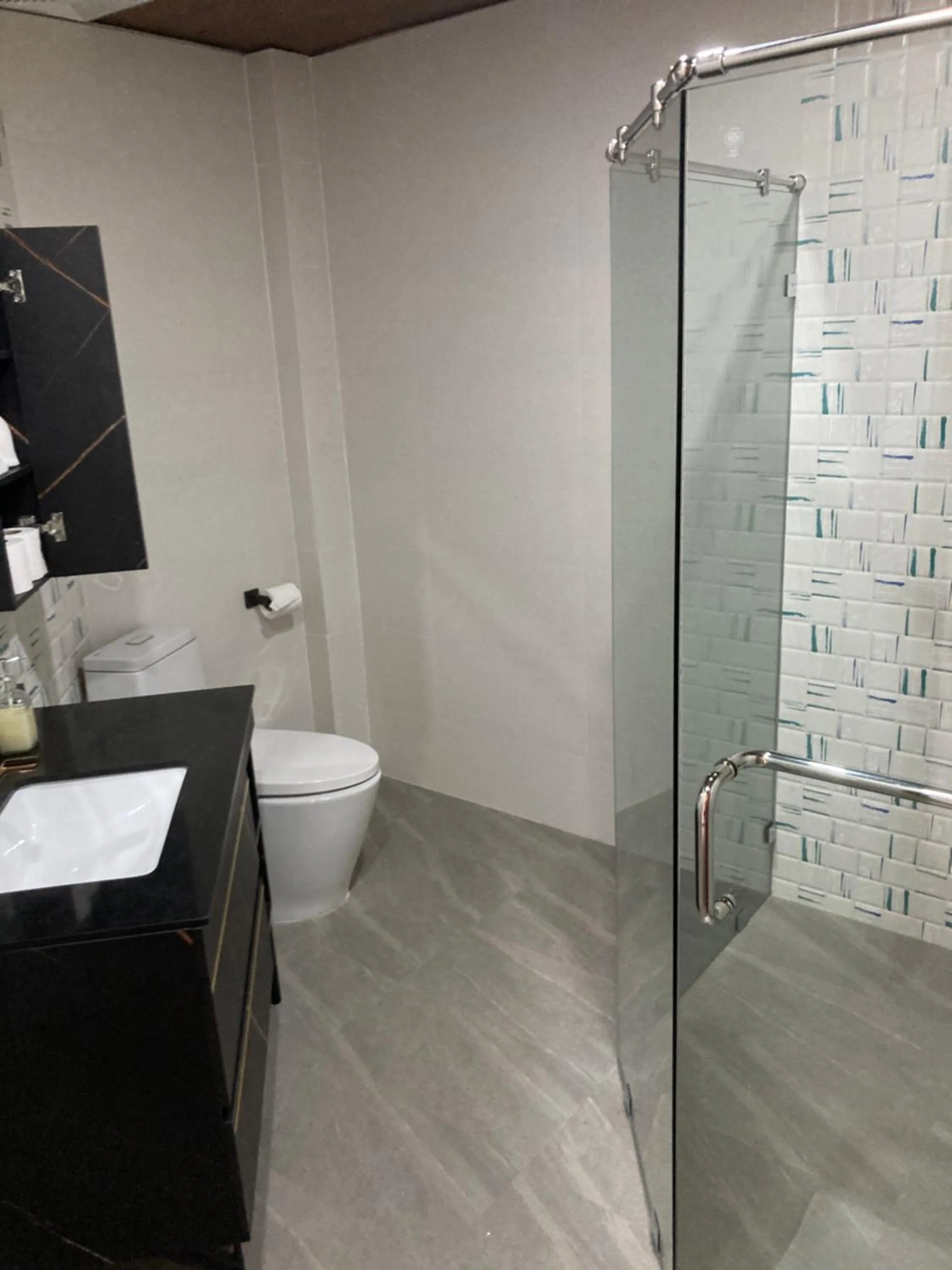 Bathroom in Sunset At Aninuan Beach Resort